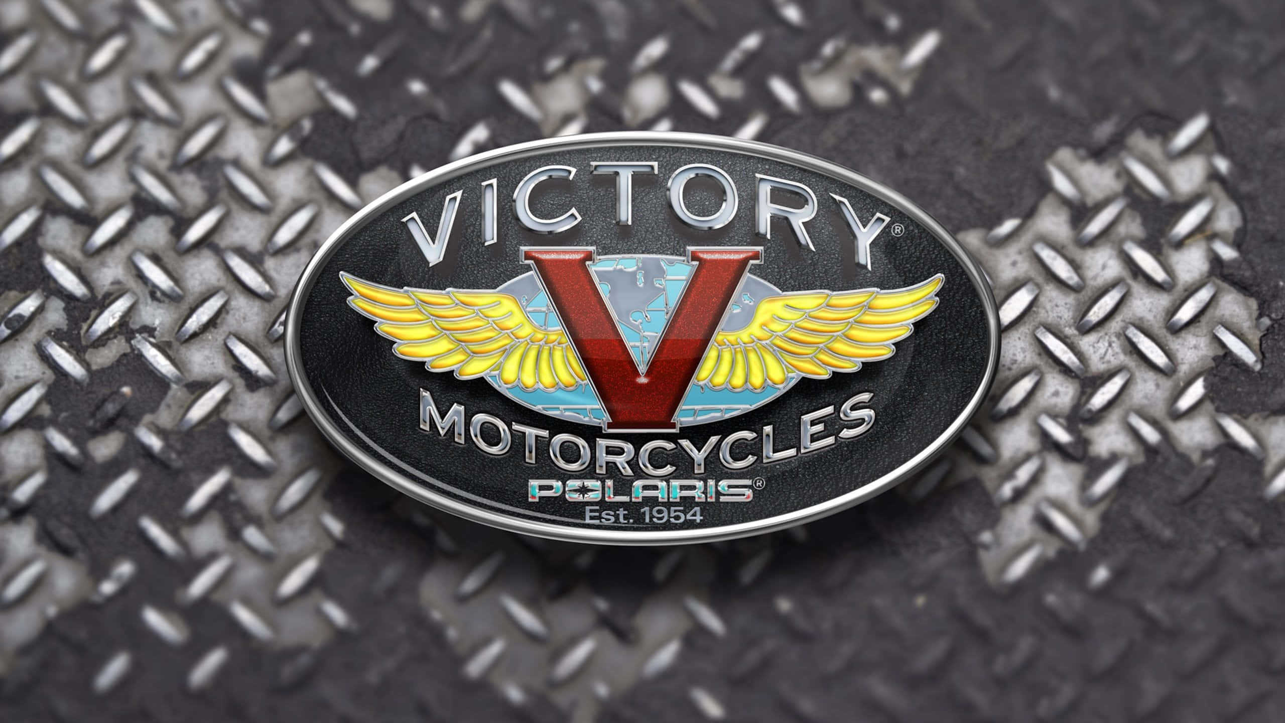 A Stunning Victory Motorcycle Ready To Hit The Road Background