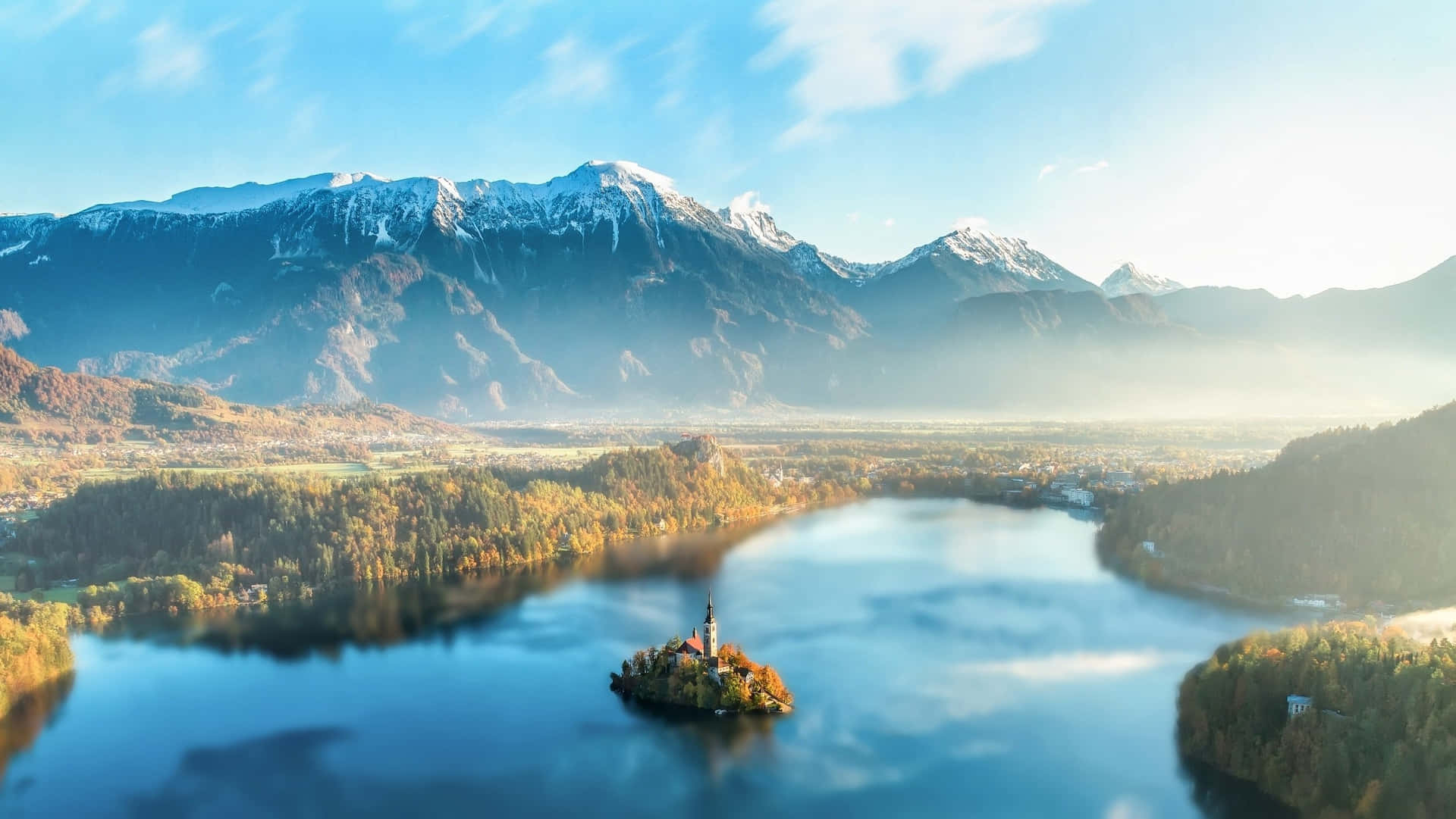 A Stunning View Of The Julian Alps Peak With Lake Bled In The Background Background