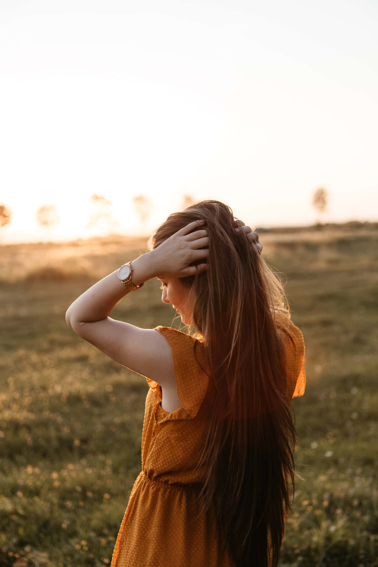 A Stunning Woman Enjoying A Beautiful Day Surrounded By Nature
