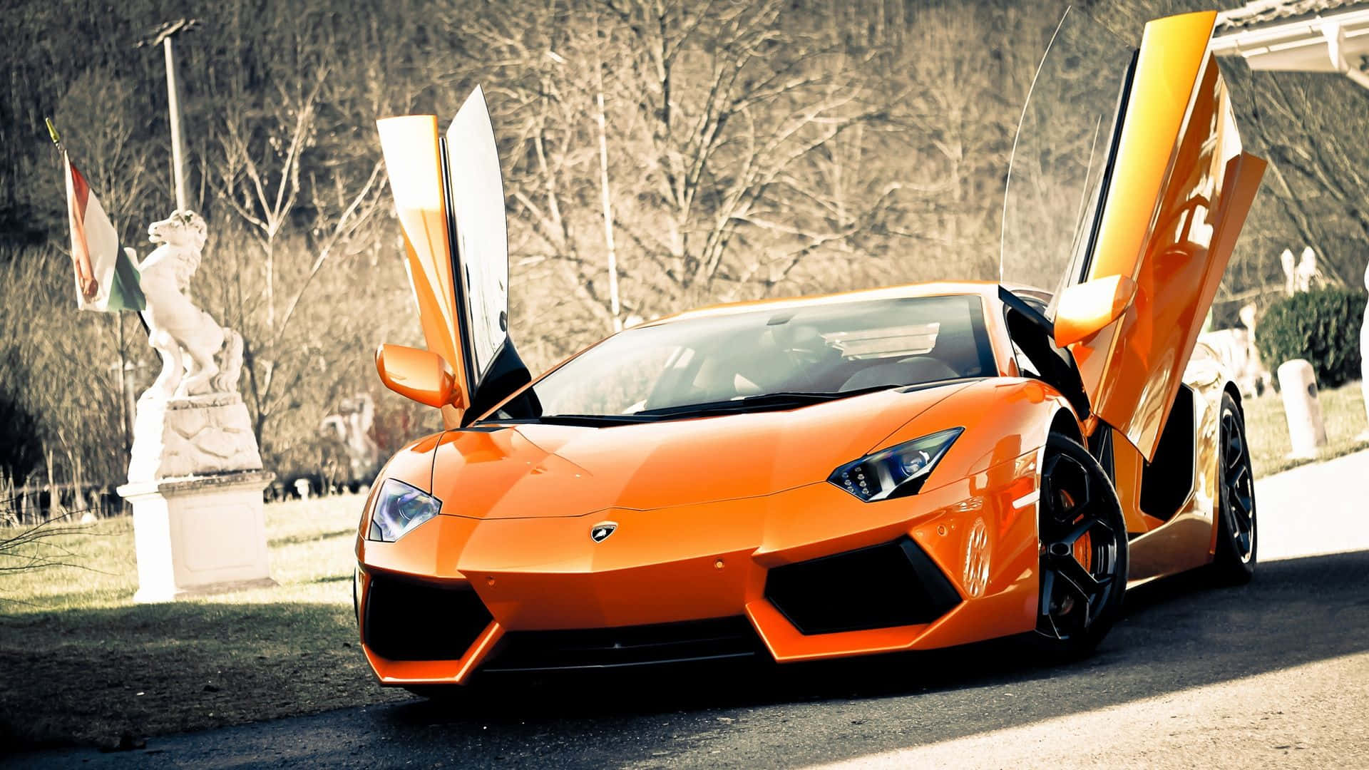A Stylish Red Vehicle In High-definition Background