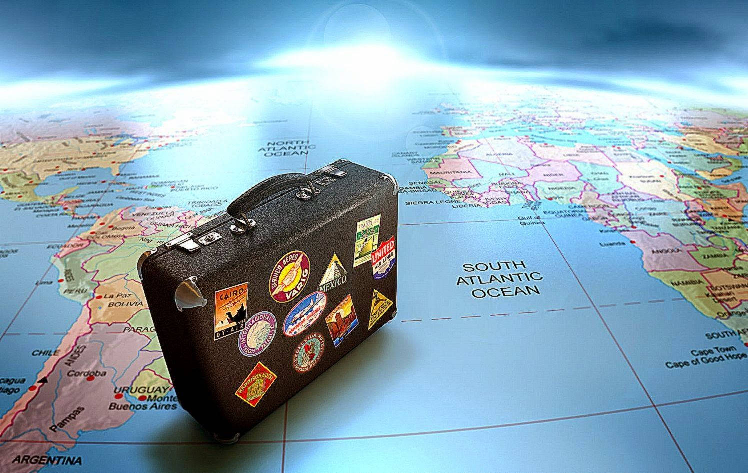 A Suitcase On A Map Background