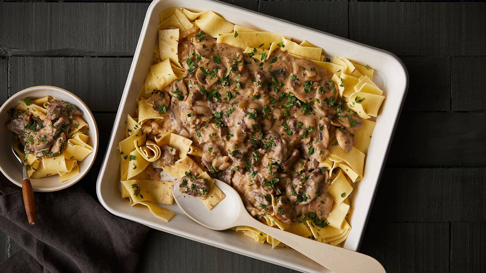 A Sumptuous Serving Of Beef Stroganoff With Pappardelle Pasta Background