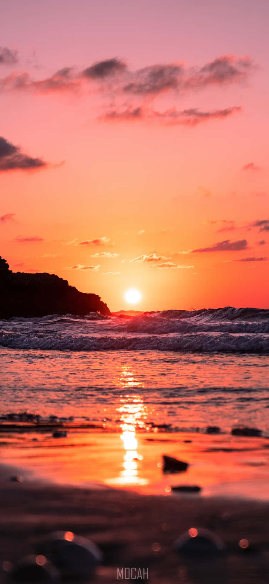 A Sun-kissed Sunrise On A Beach, Perfect For A Scenic Iphone Wallpaper Background