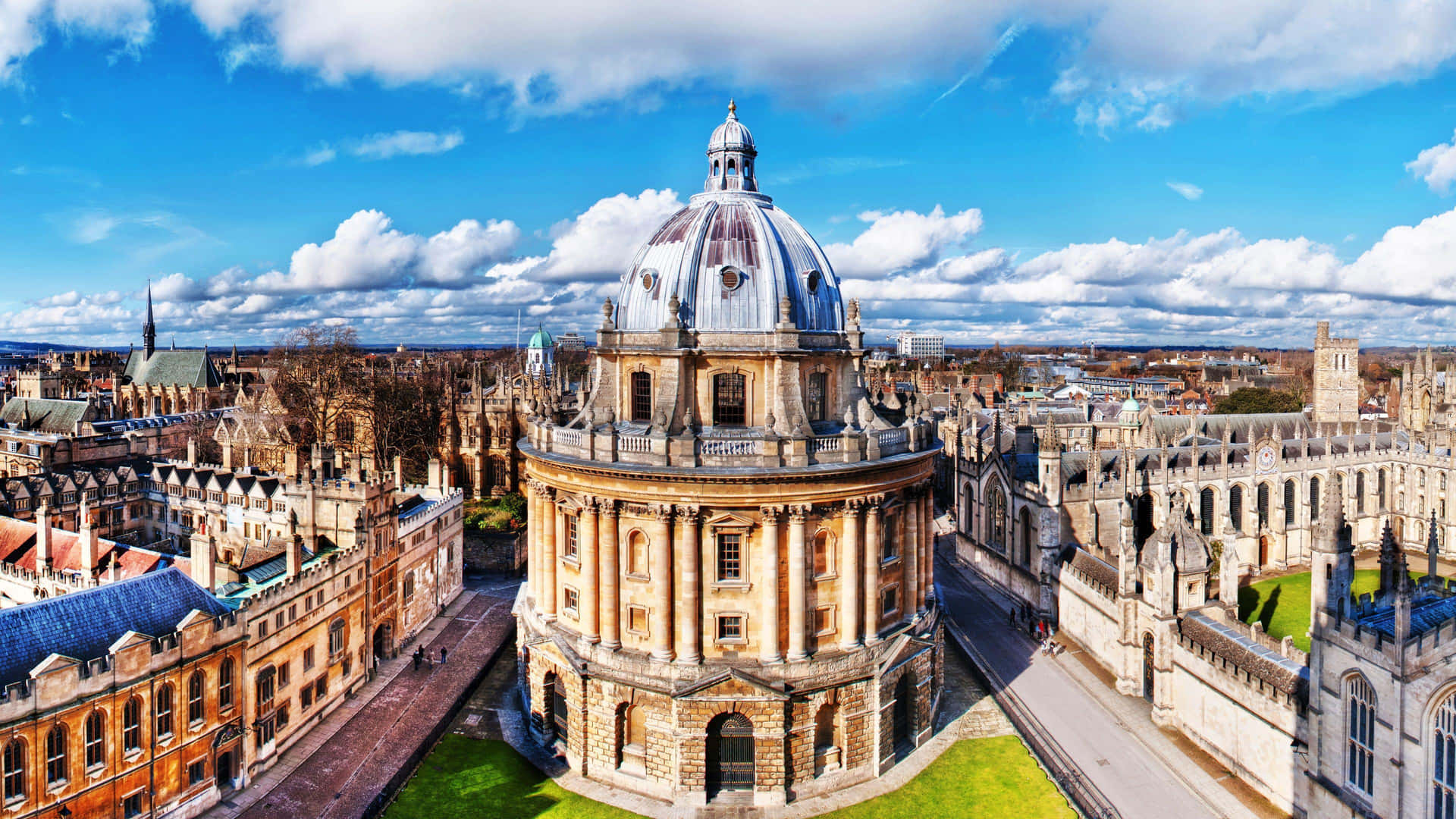 A Sunny Day At Oxford University With Radcliffe Camera In View Background