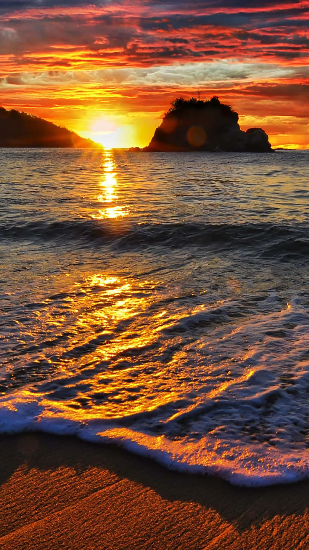 A Sunset On A Beach With Waves Background