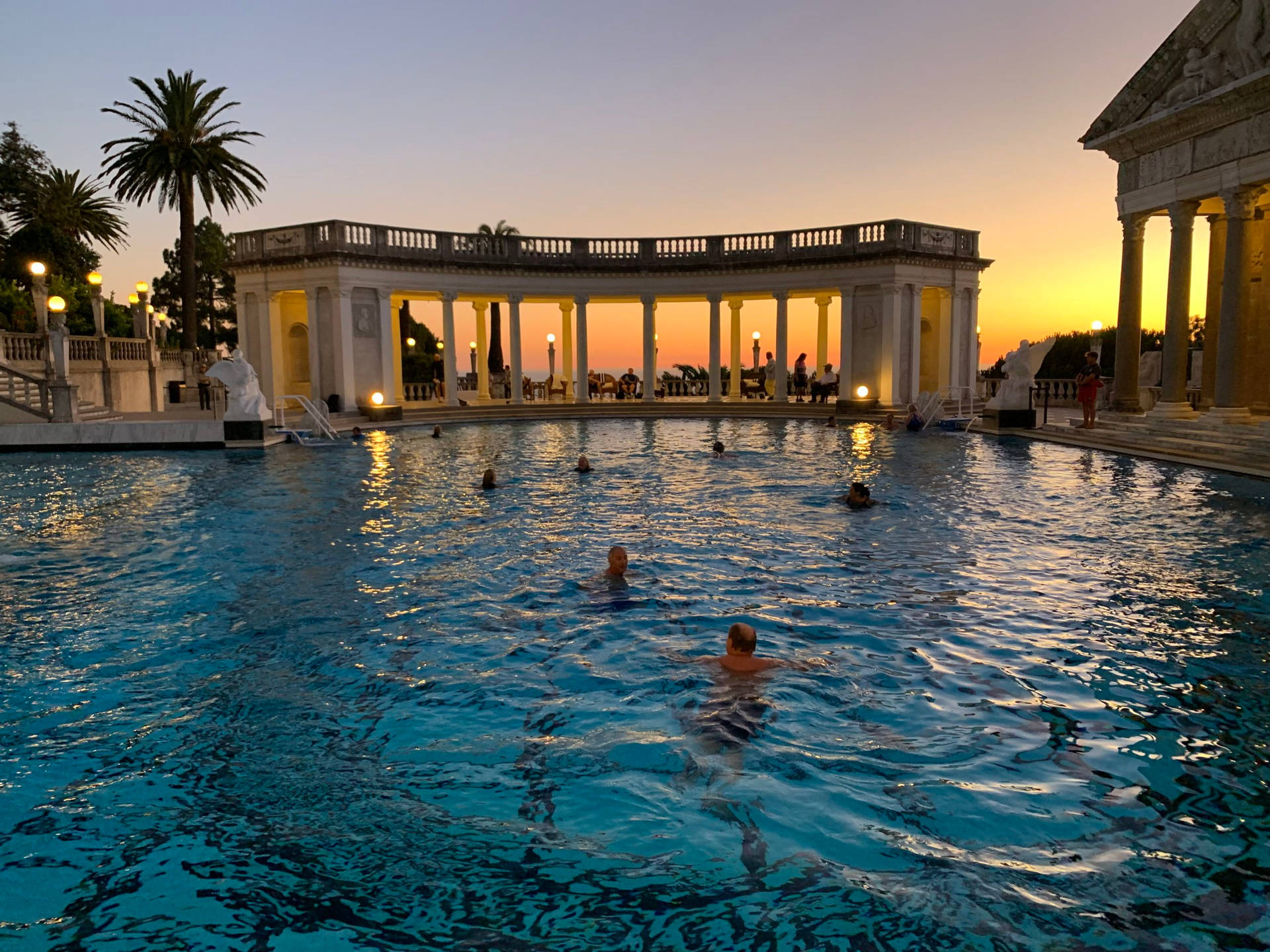 A Sunset View At The Neptune Pool Of Hearst Castle Background