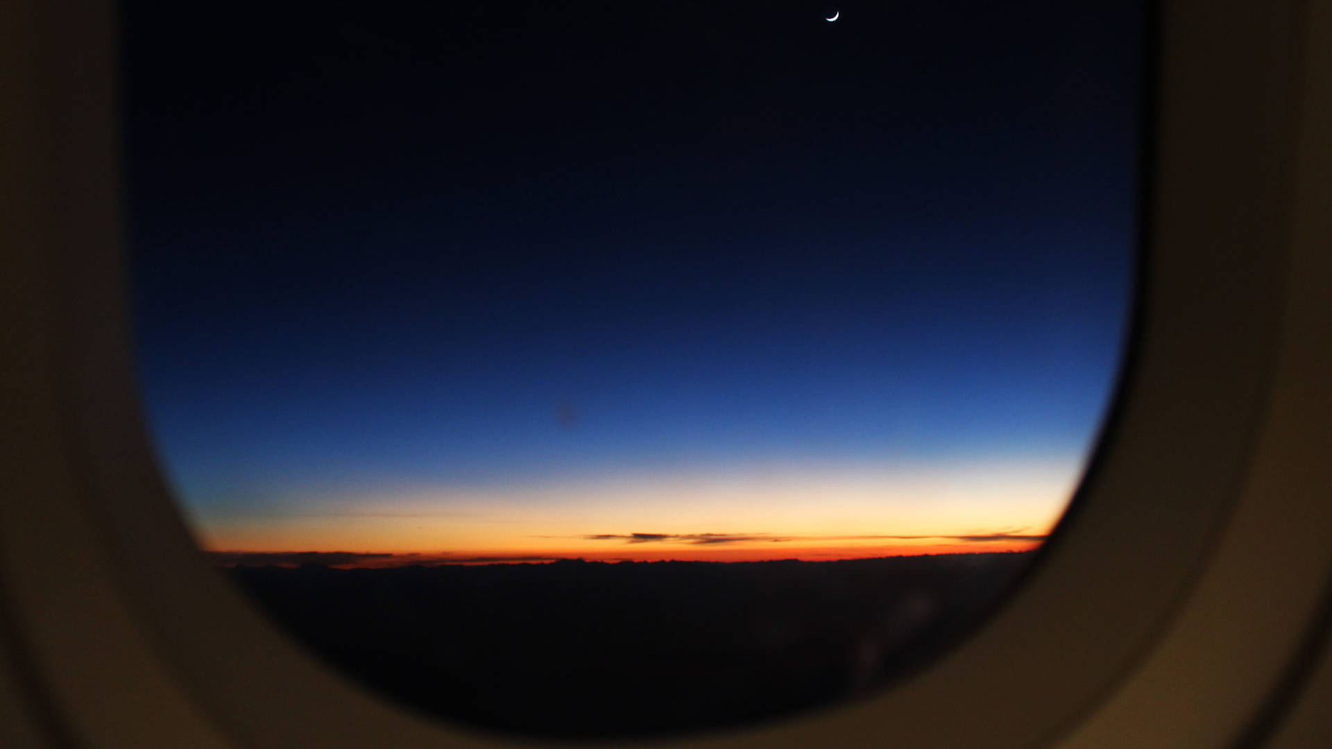 A Sunset View From A Plane Window Background