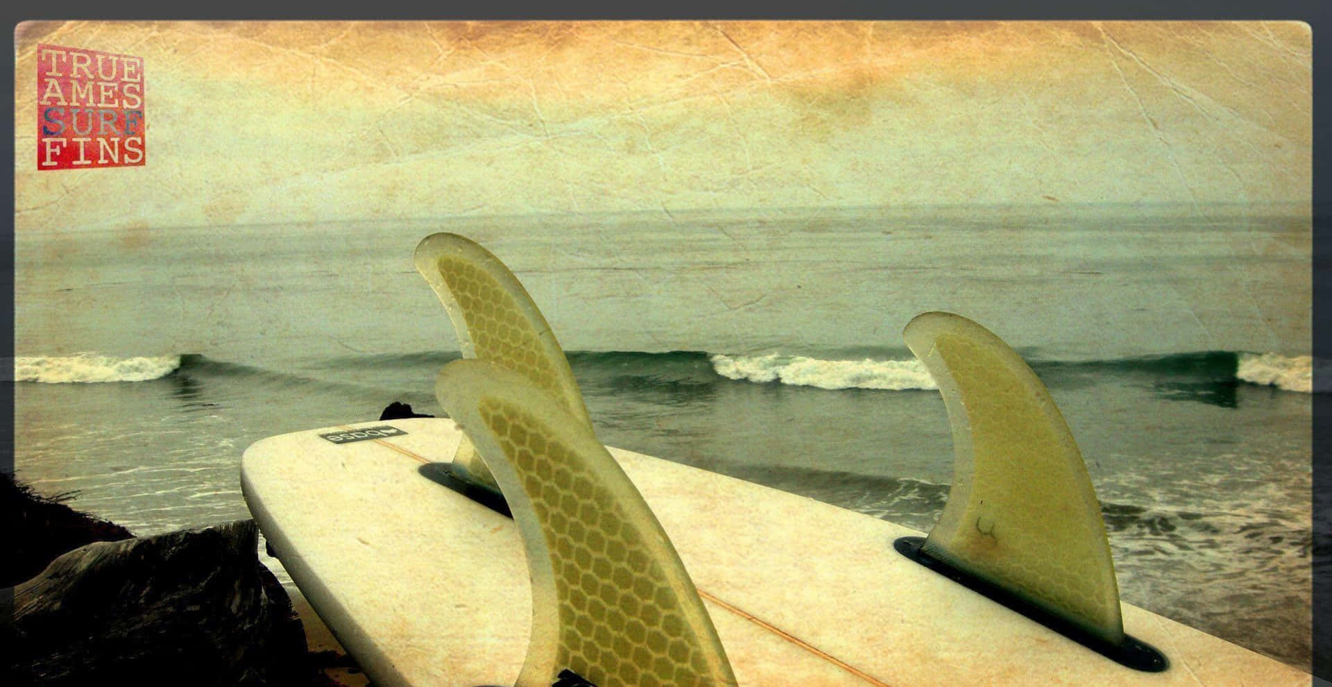 A Surfboard On The Beach Background