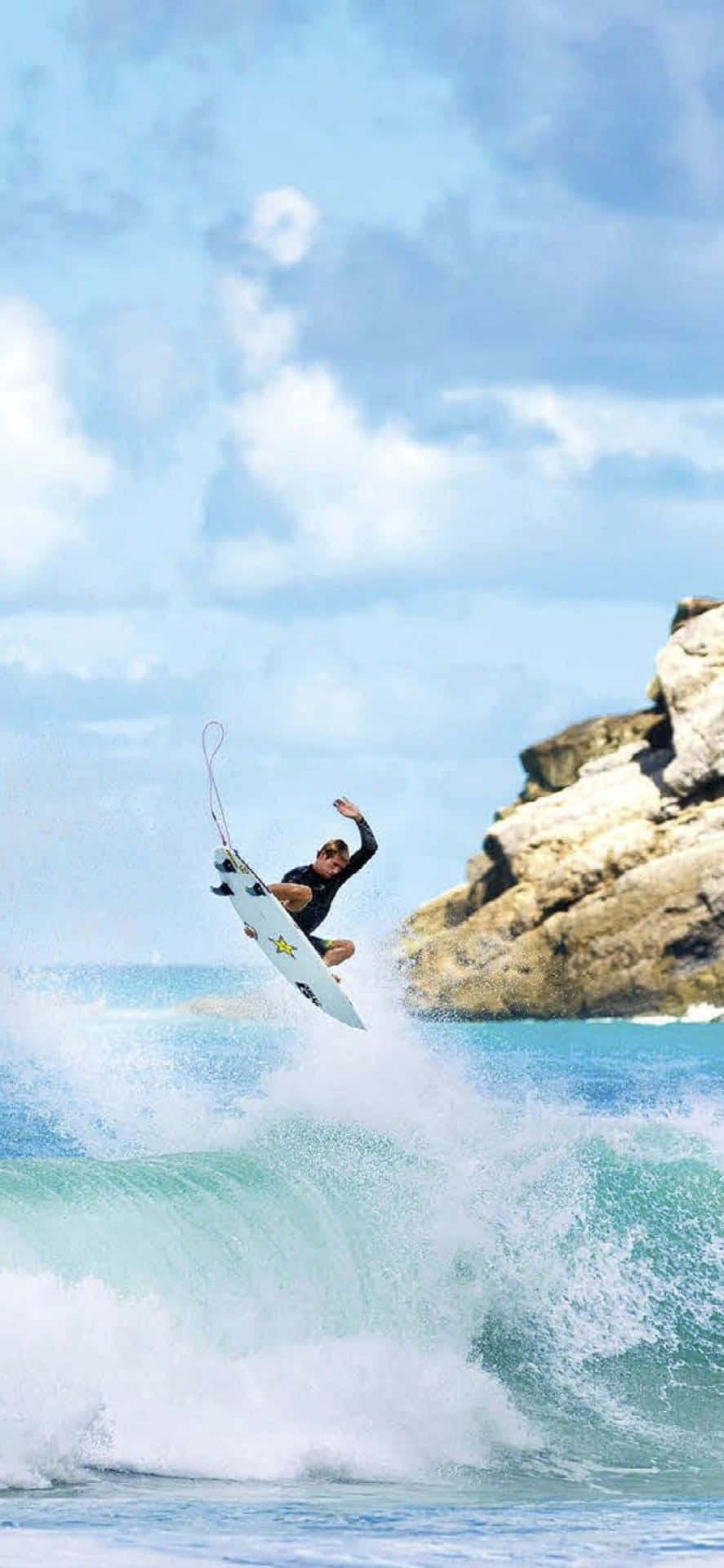 A Surfer Is Riding A Wave Background