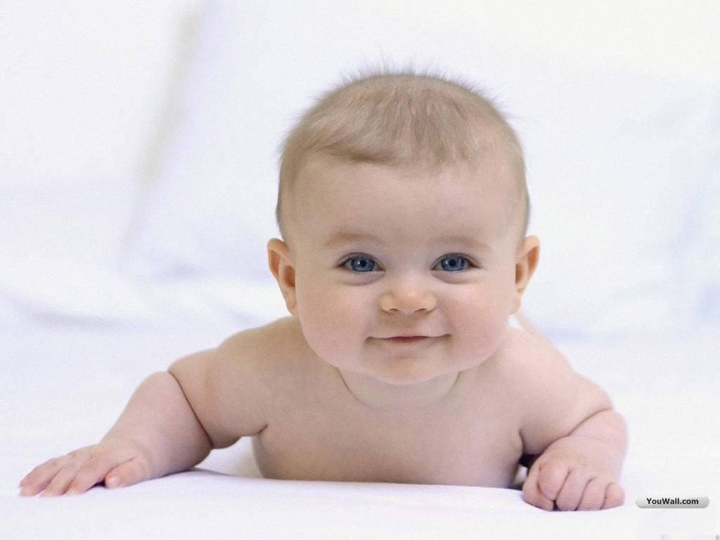 A Sweet Little Baby Boy In White