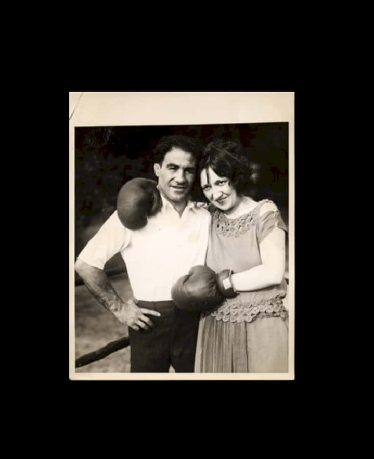 A Sweet Photo Of Johnny Dundee And His Wife Background