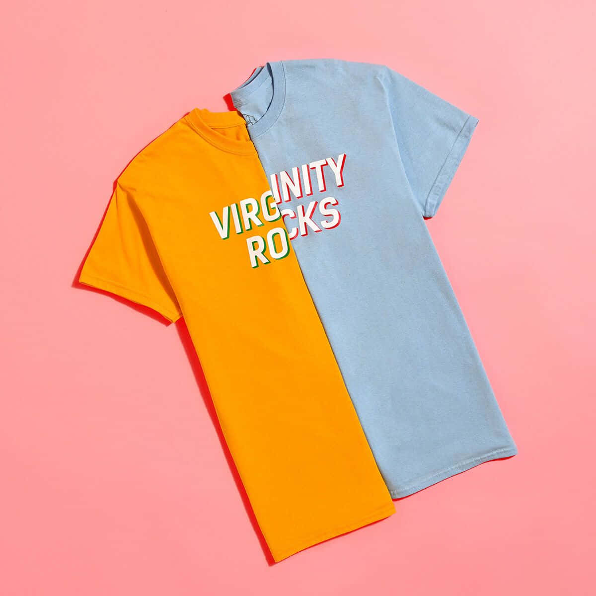 A T - Shirt With The Words Virginity Rocks On It