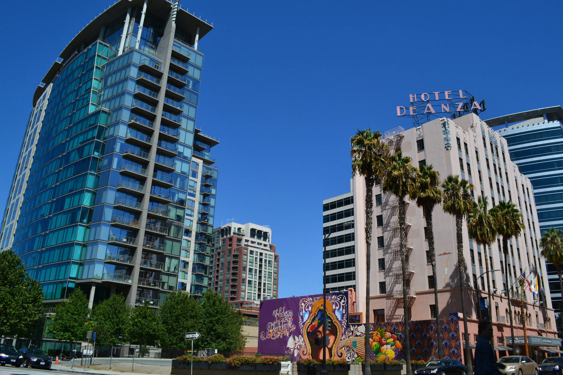 A Tall Building With A Clock On It Background