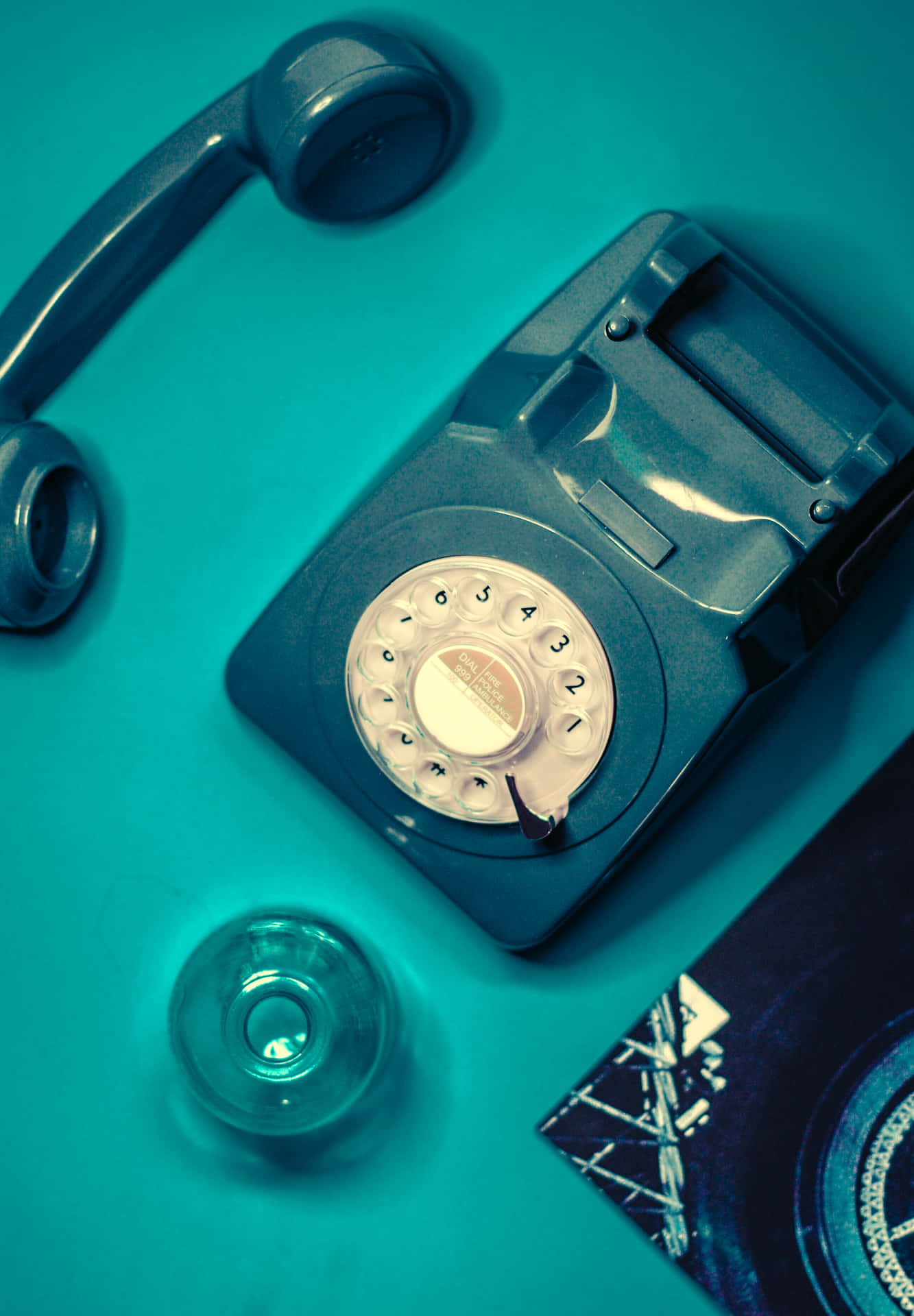 A Telephone On A Blue Table Background