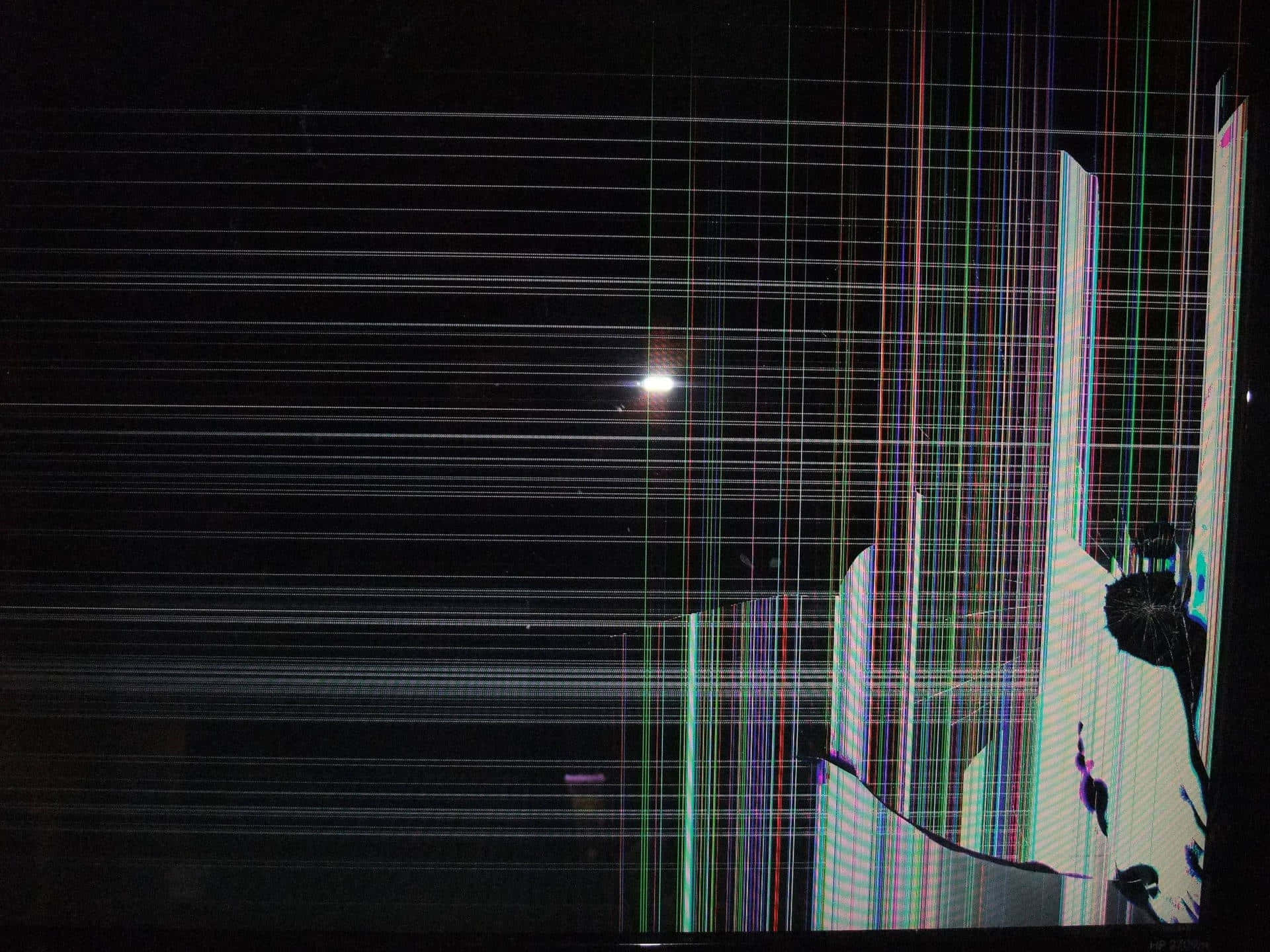 A Television Screen With A Man Sitting On It Background
