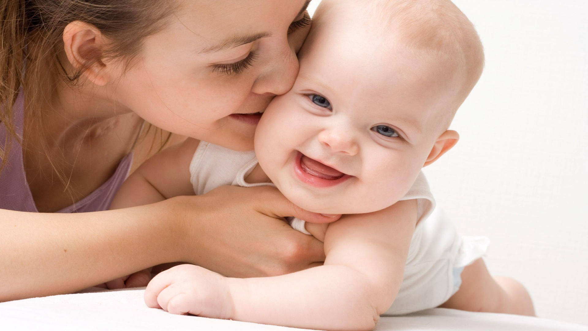 A Tender Moment Between Mother And Child Background