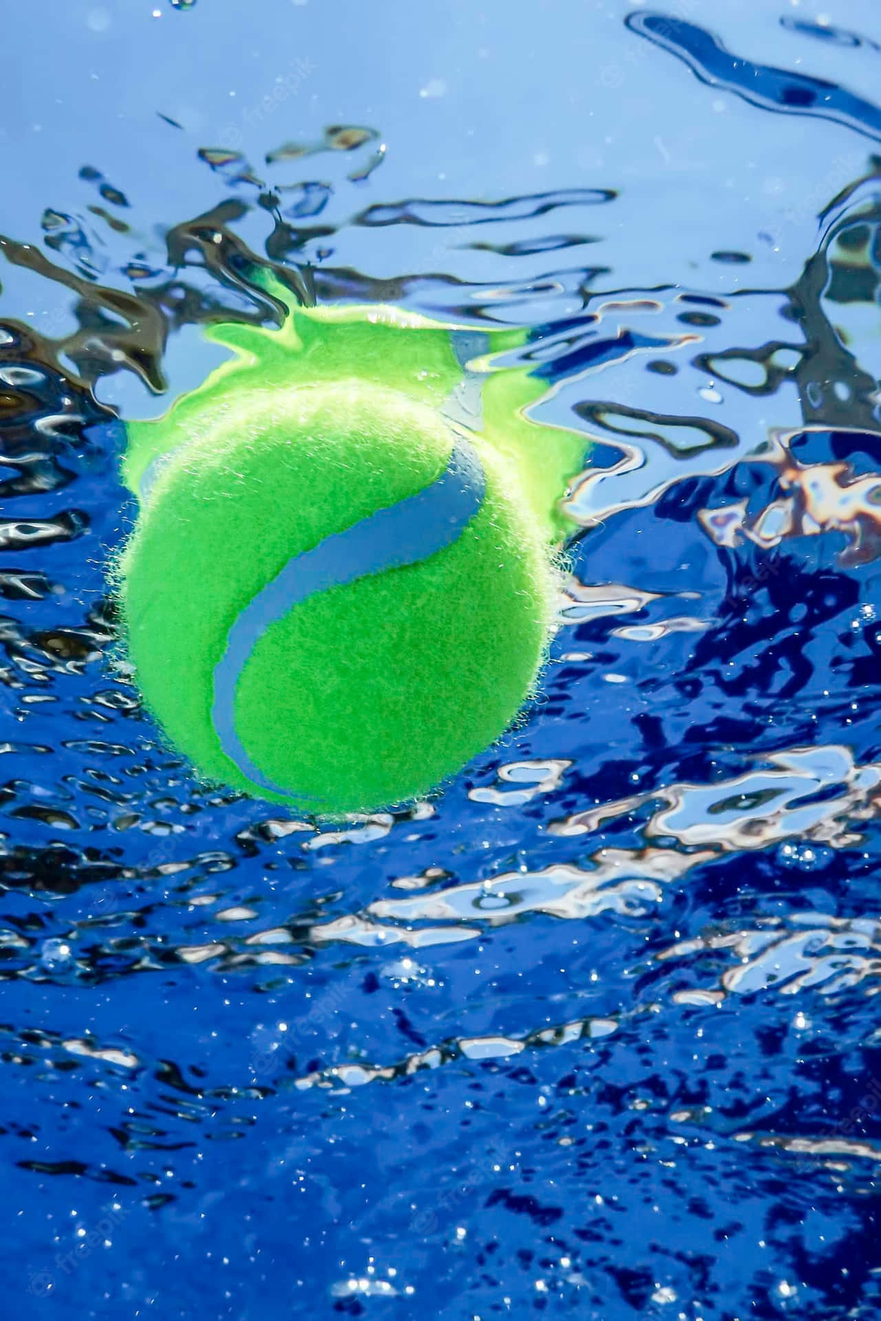 A Tennis Ball Floating In The Water Background