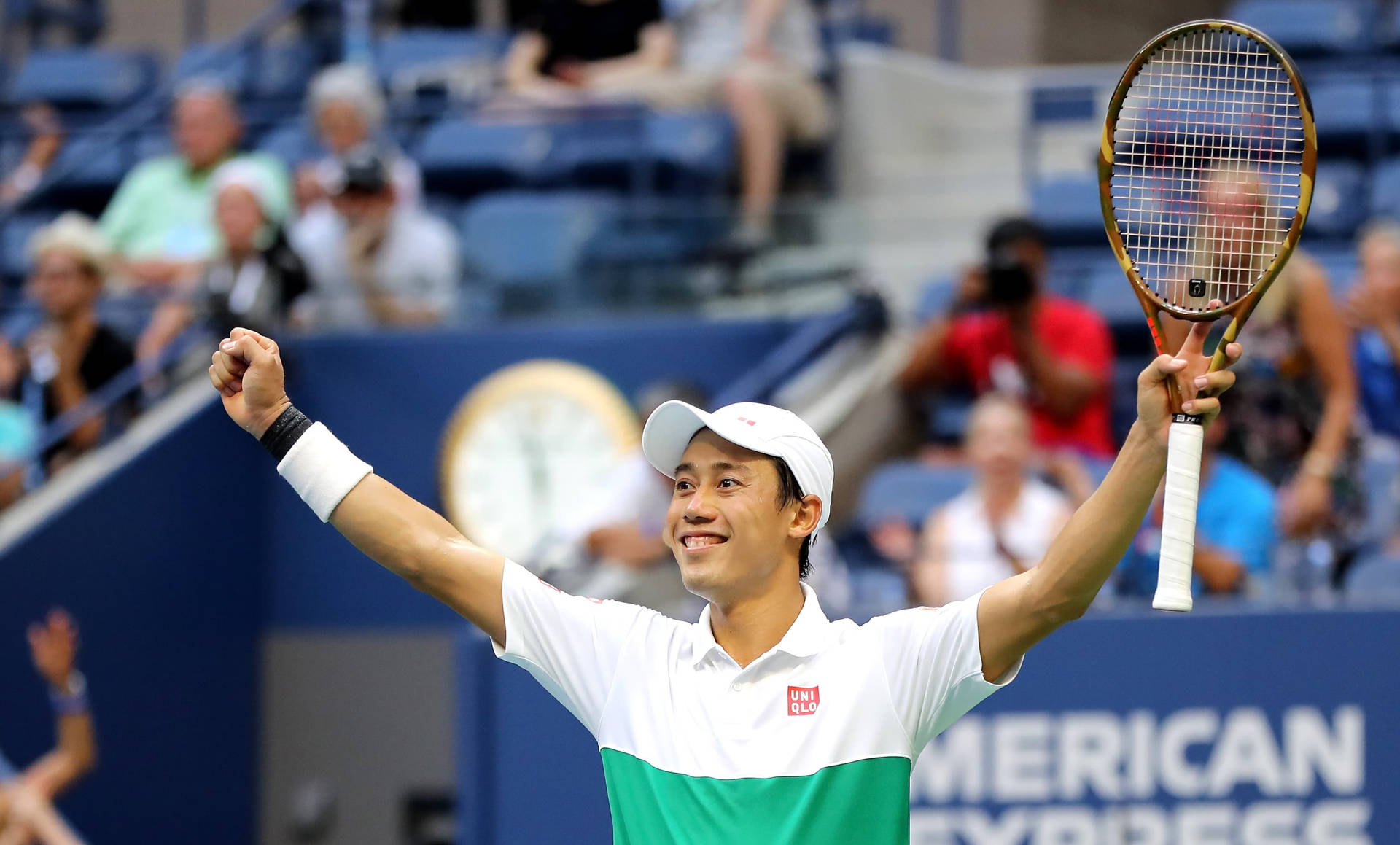 A Tennis Player Celebrating His Win On A Court Background