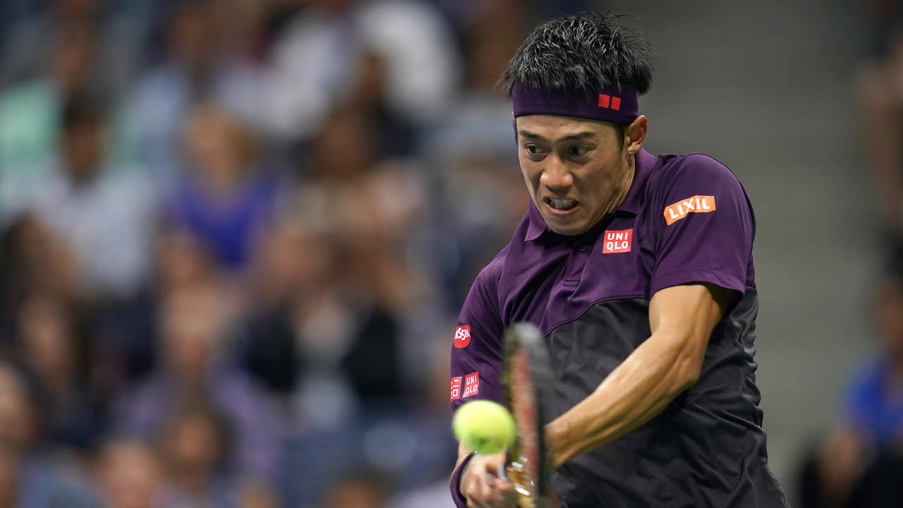 A Tennis Player Is Hitting A Ball With His Racket Background