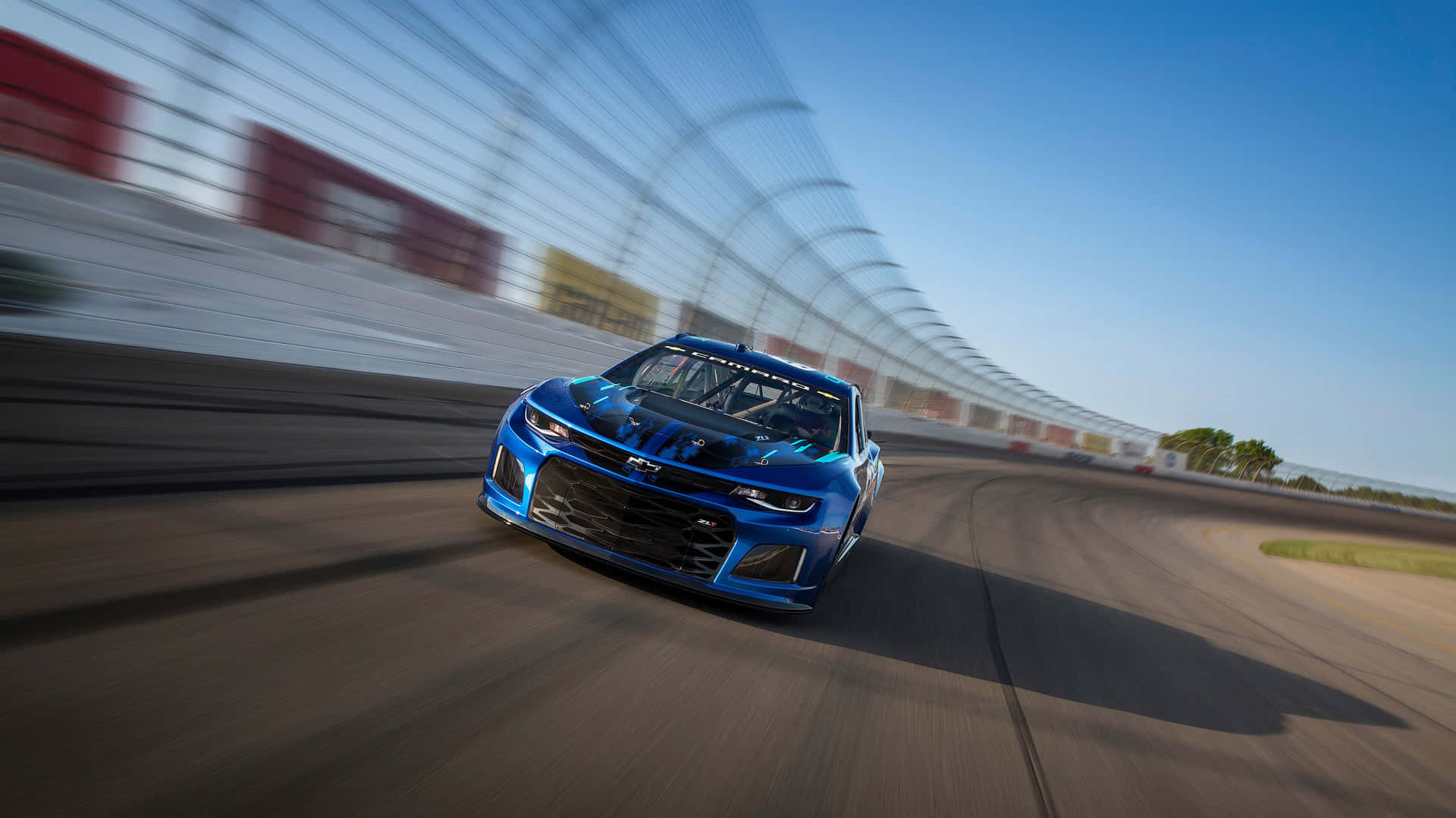 A Thrilling Display Of Speed: Nascar Racing Background