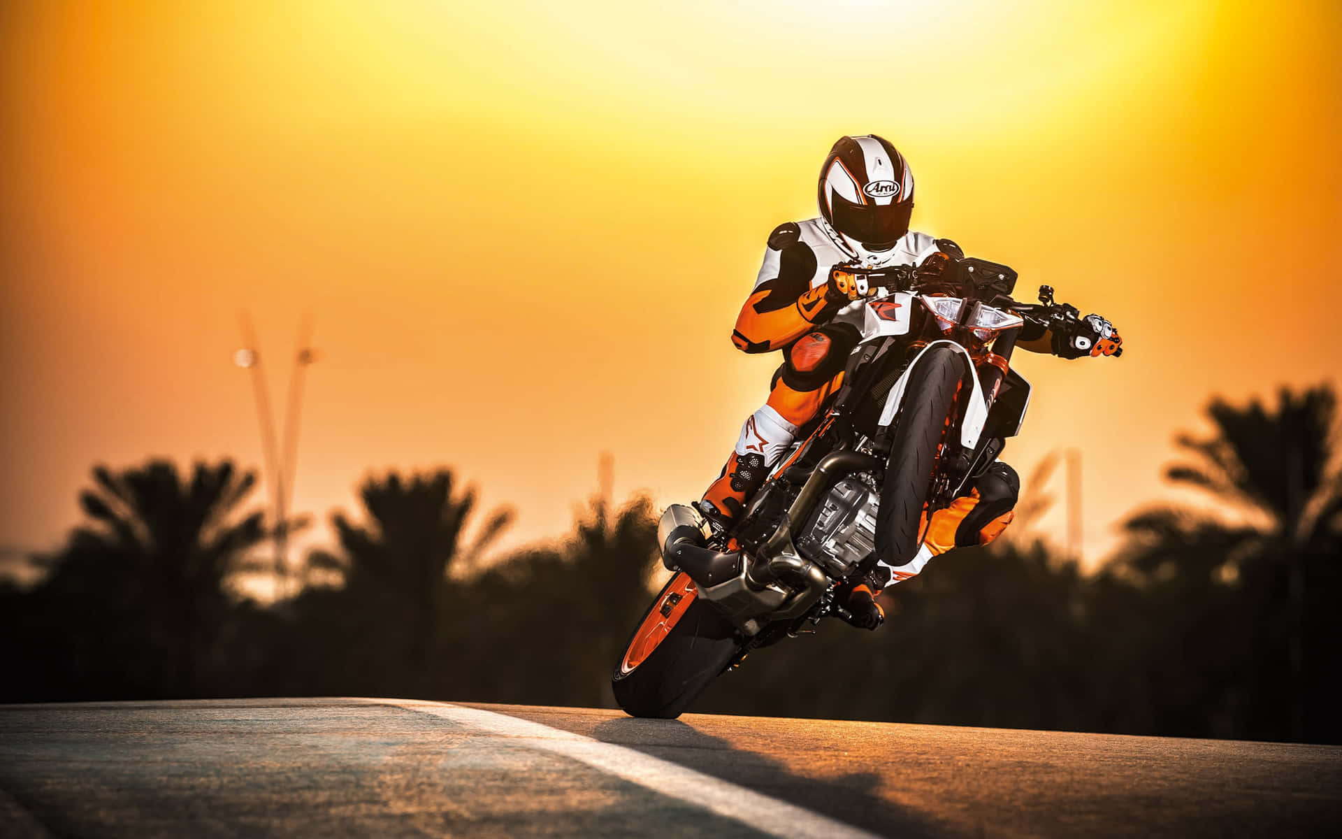 A Thrilling Ktm Adventure Motorcycle On An Open Road. Background