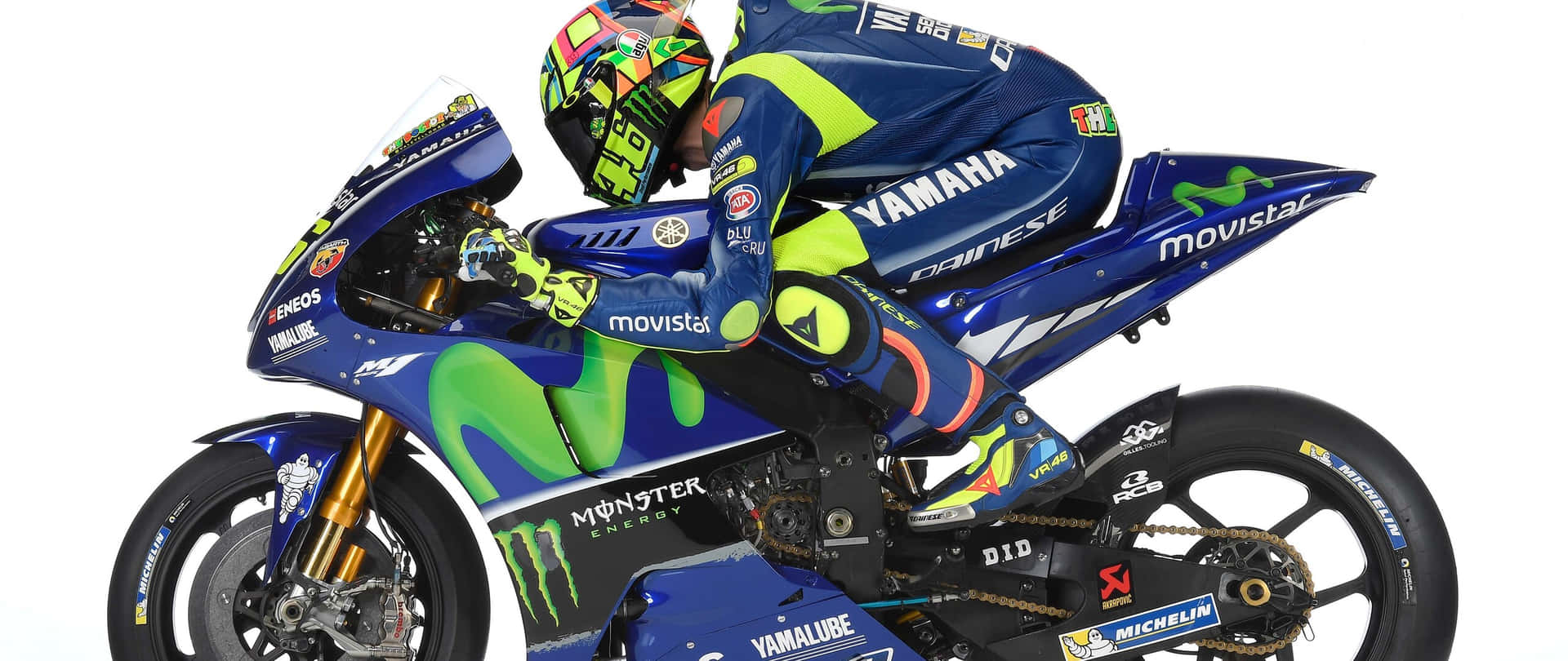 A Thrilling Ride With The Vr46 Yamaha Monster Energy Motorcycle Background