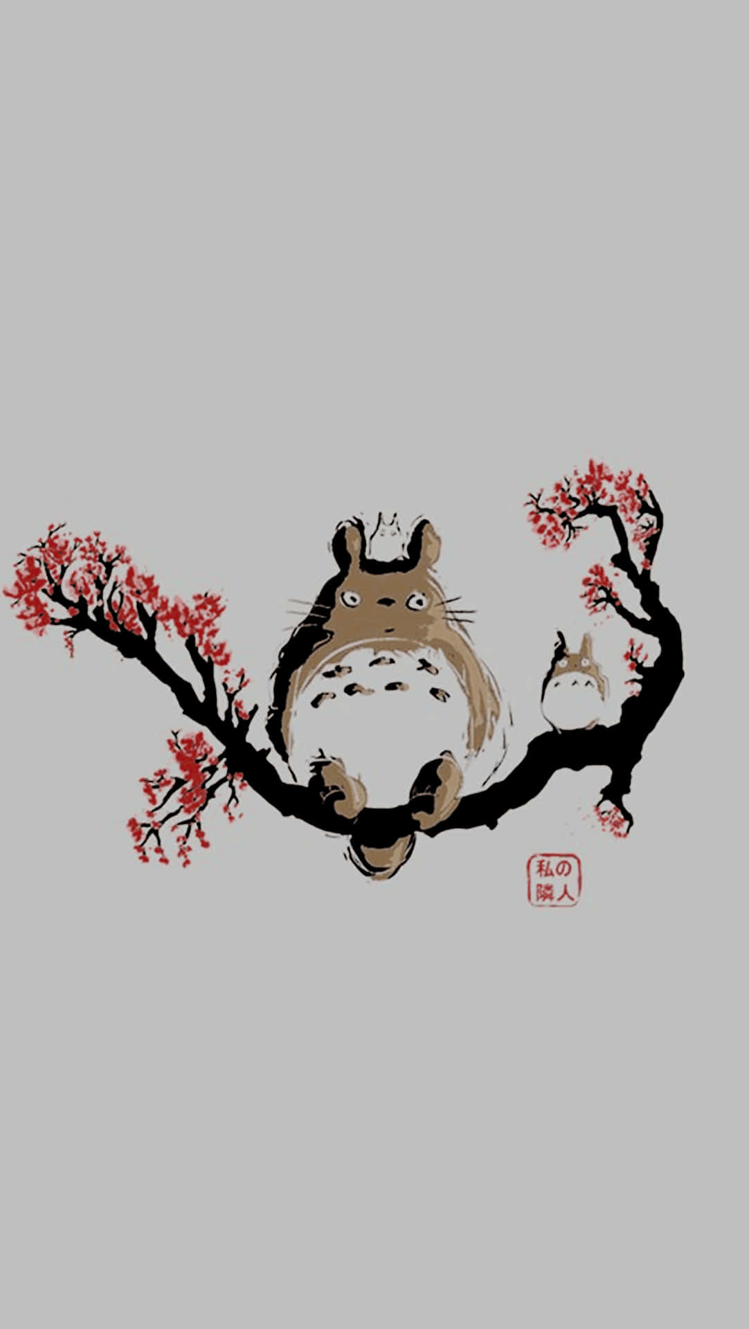 A Totoro Sitting On A Branch With Red Flowers