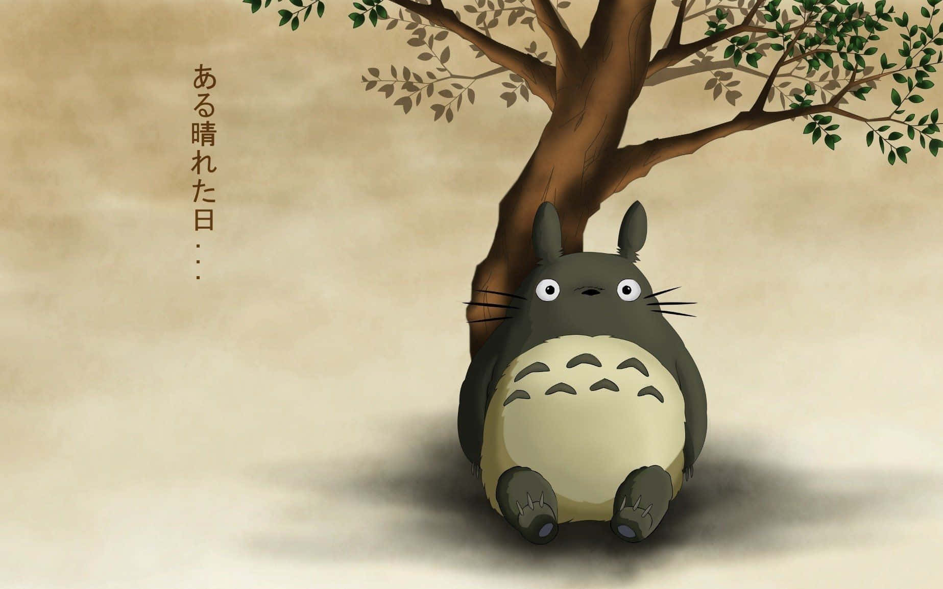 A Totoro Sitting Under A Tree