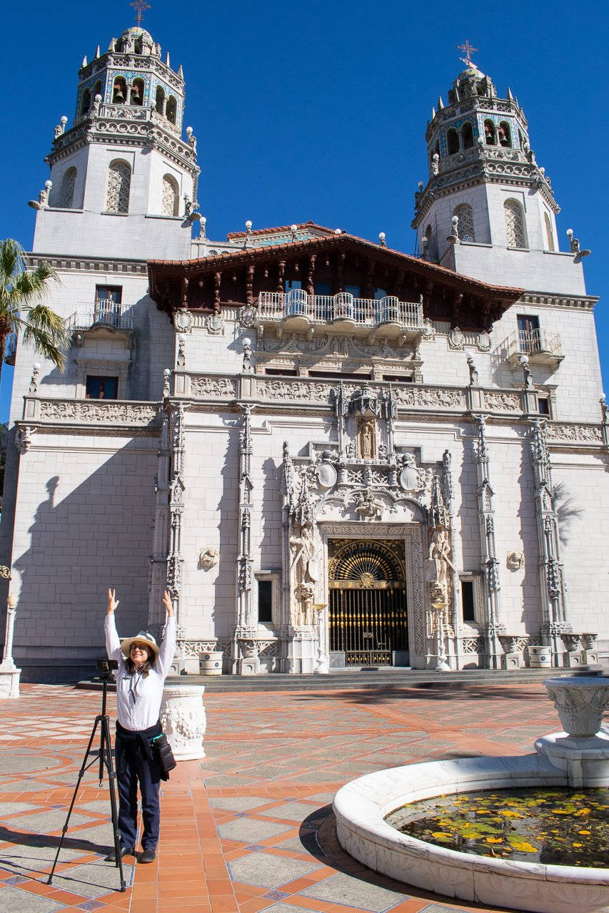 A Tourist In Front Of The Hearst Castle