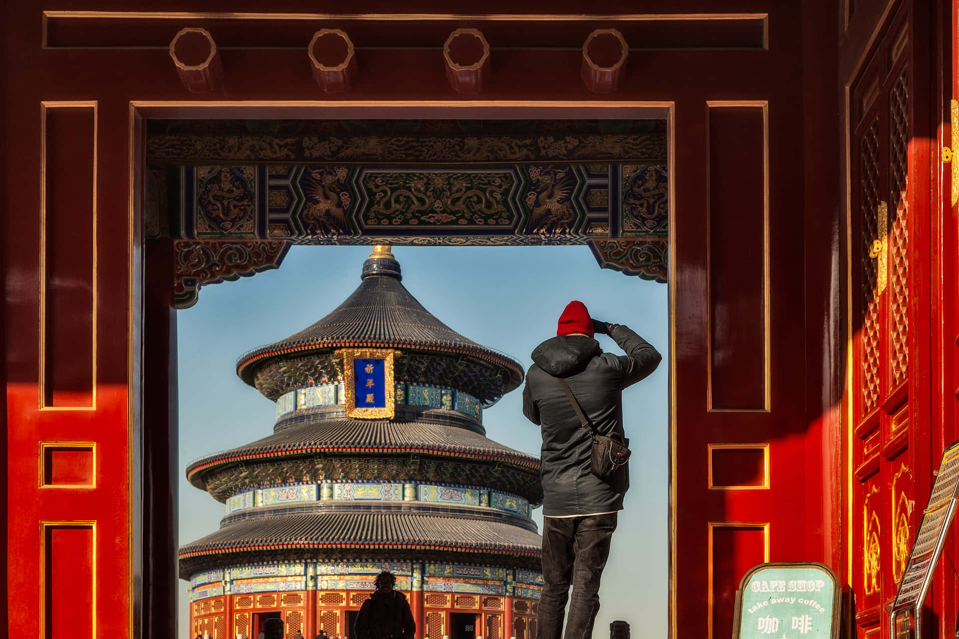 A Tourist Standing At The Temple Of Heaven's North Hall