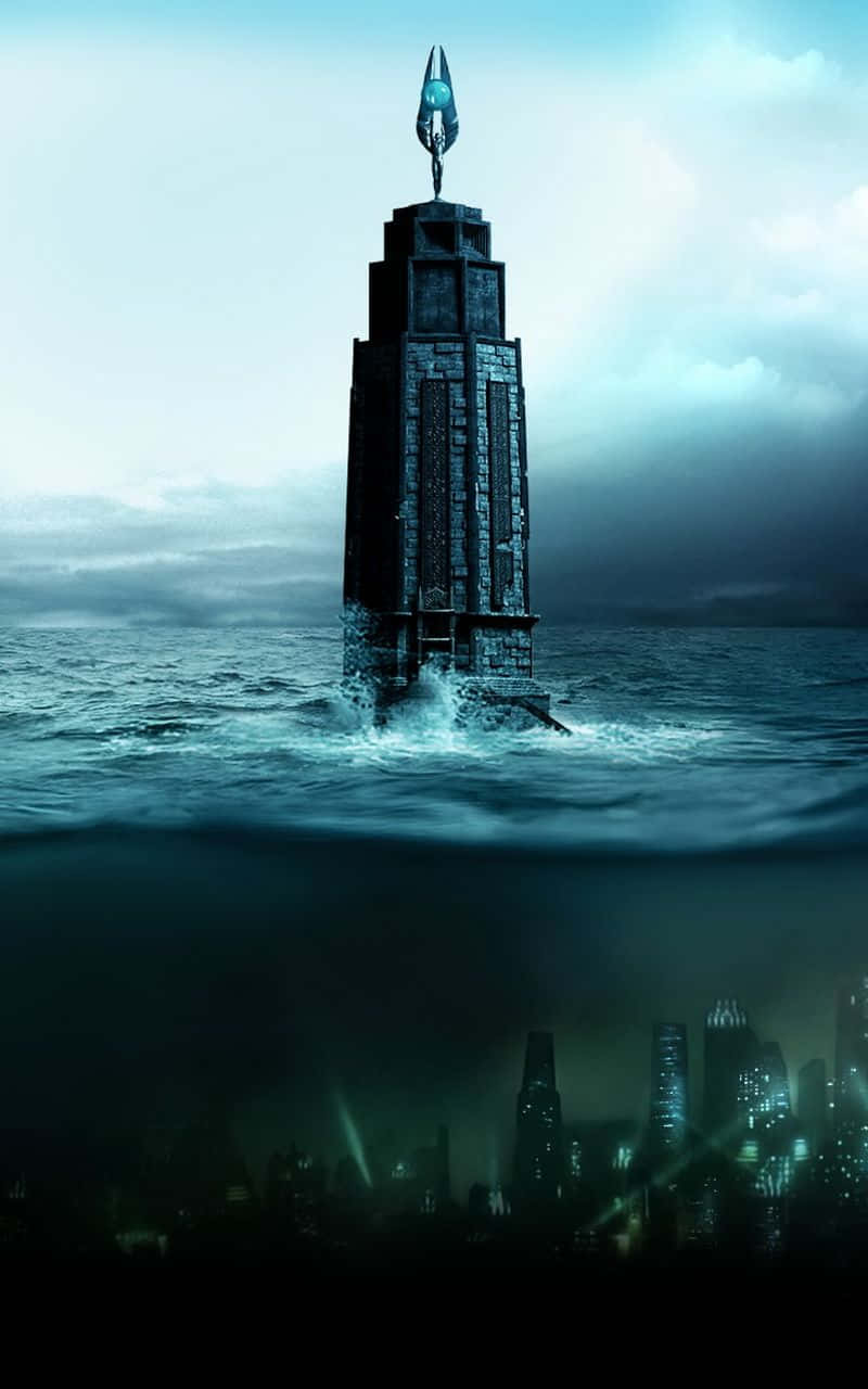 A Tower In The Ocean With A City In The Background Background