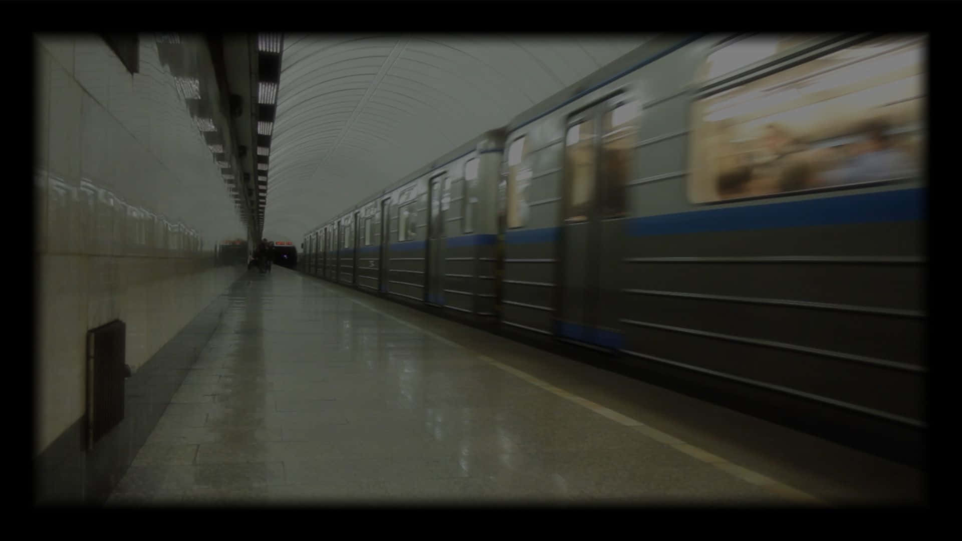 A Train Is Moving Down The Subway