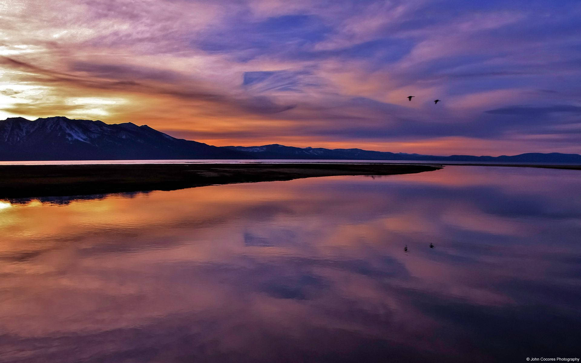 A Tranquil Lake Sunset Framed By A Digital Landscape. Background