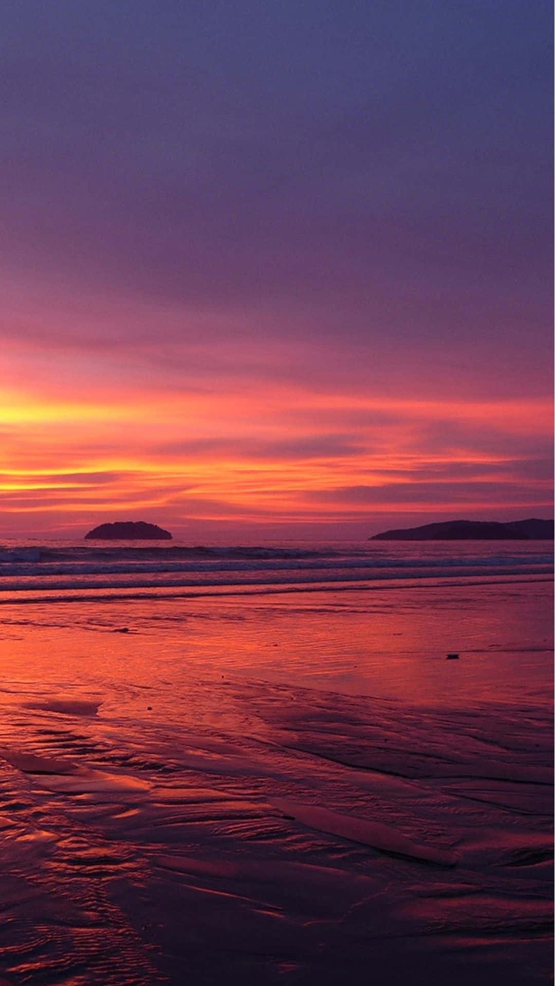 A Tranquil Sunset View Of The Beach On An Iphone Background