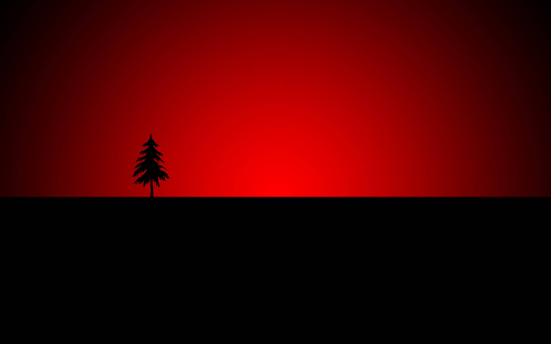 A Tree Silhouetted Against A Red Sky Background
