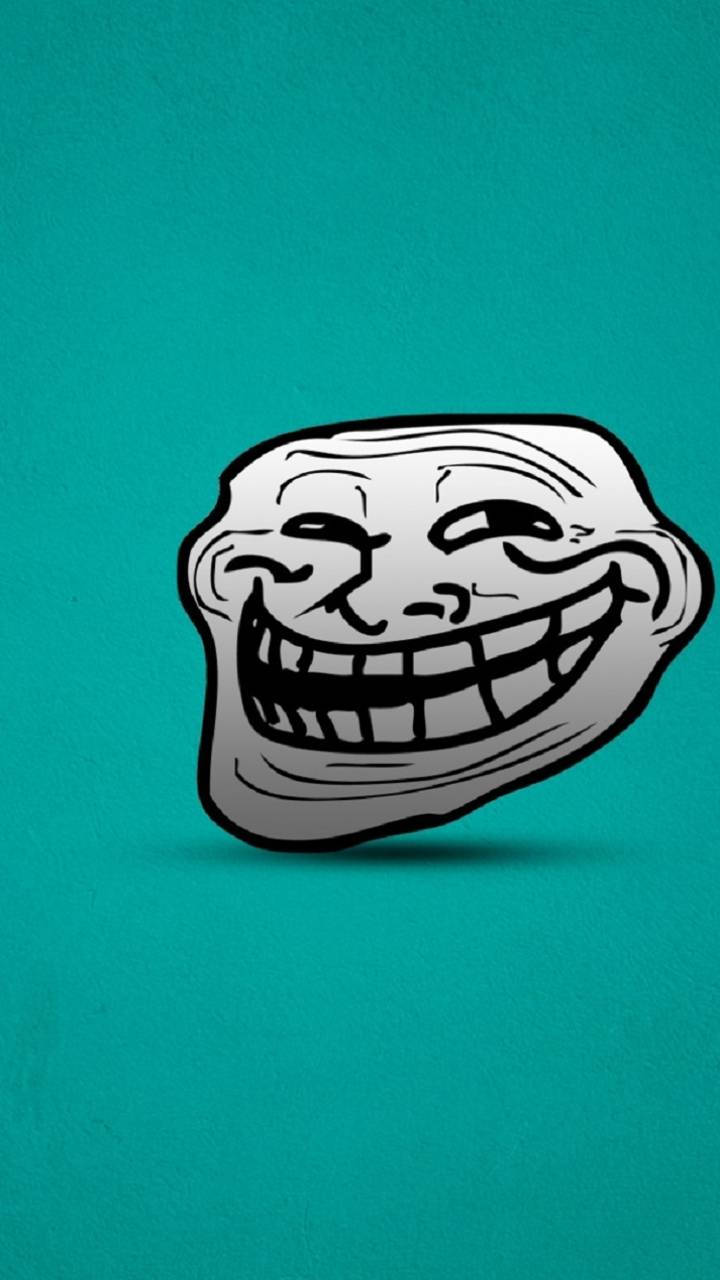 A Troll Face On A Green Background