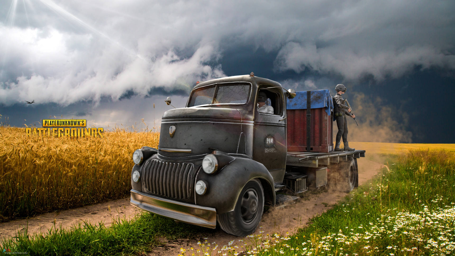 A Truck Driving Down A Road