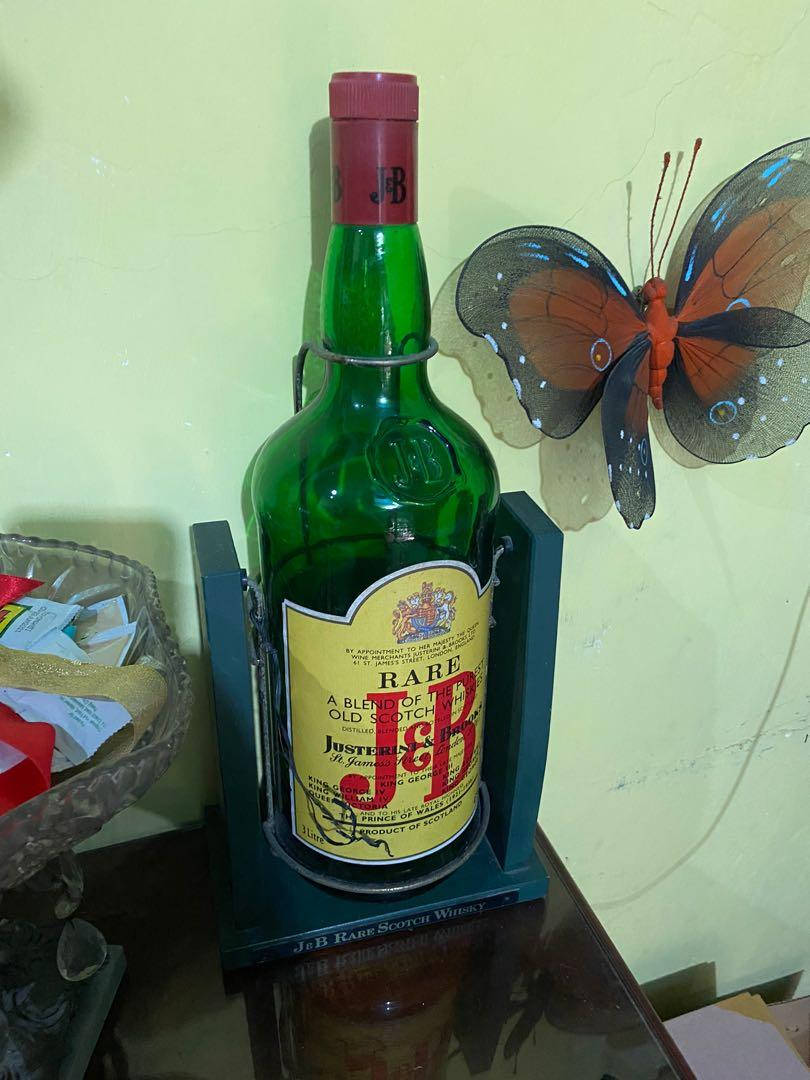 A Unique Indoor Home Décor – J&b Giant Whisky Bottle Background