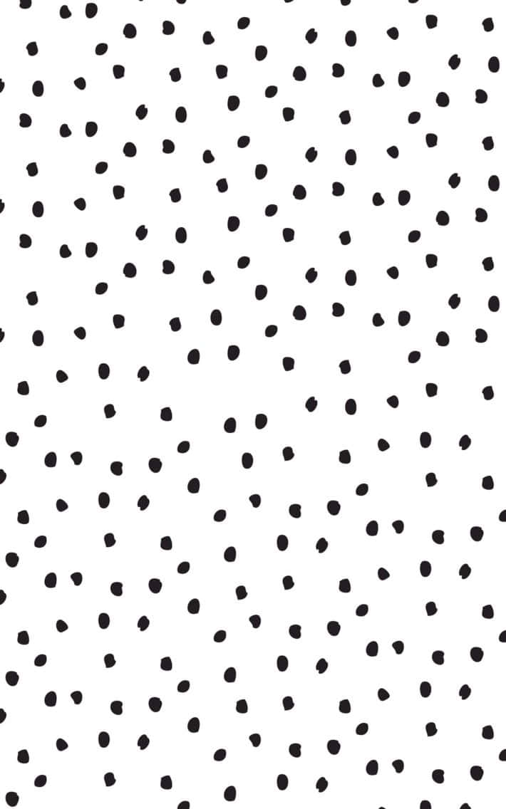 A Unique Pattern Of Black Dots Against A White Background Background
