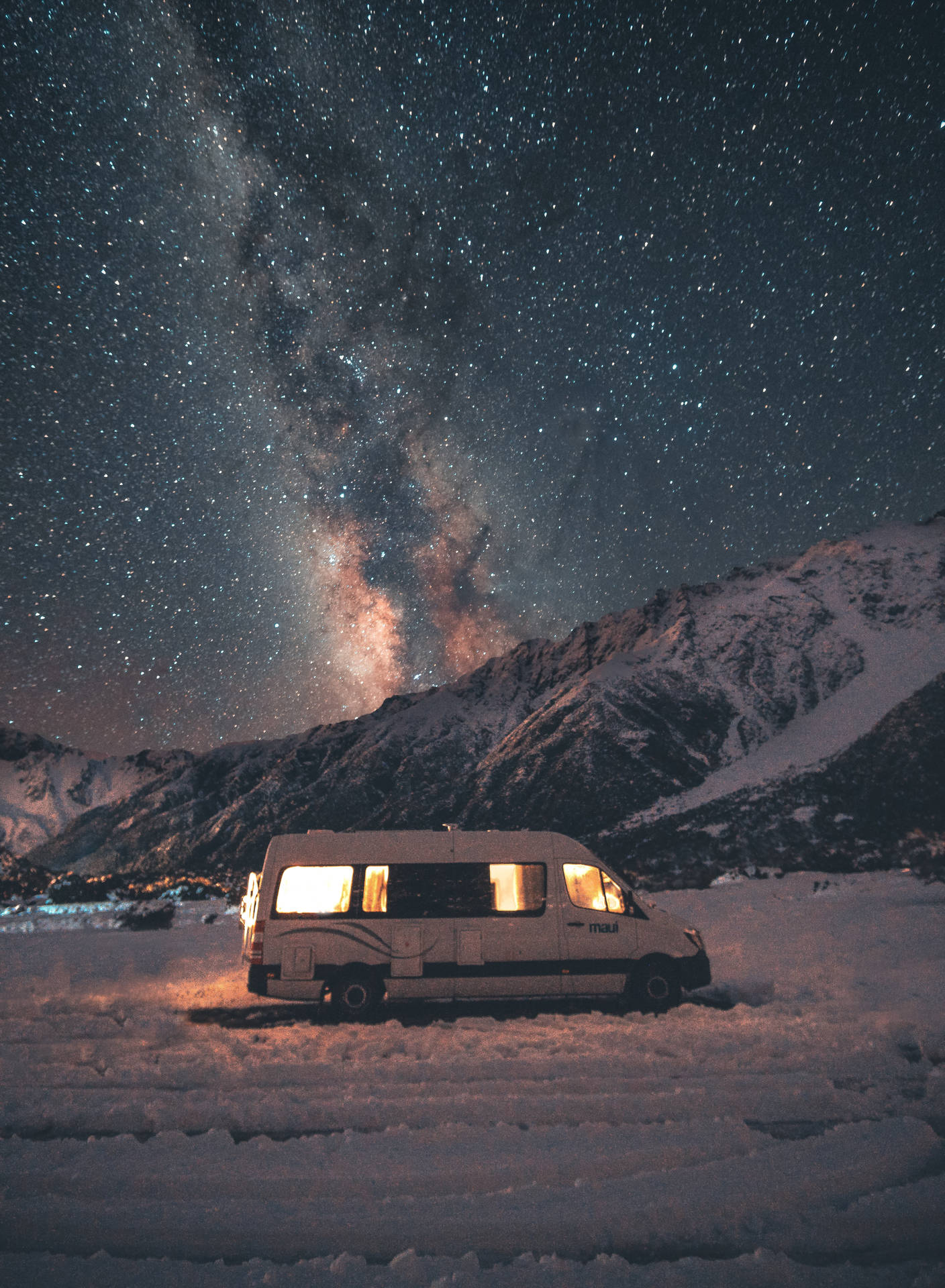 A Van Parked In The Snow Background