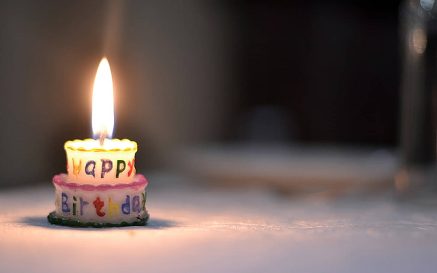 A Vibrant Celebration - Birthday Cake With Lit Candles Background