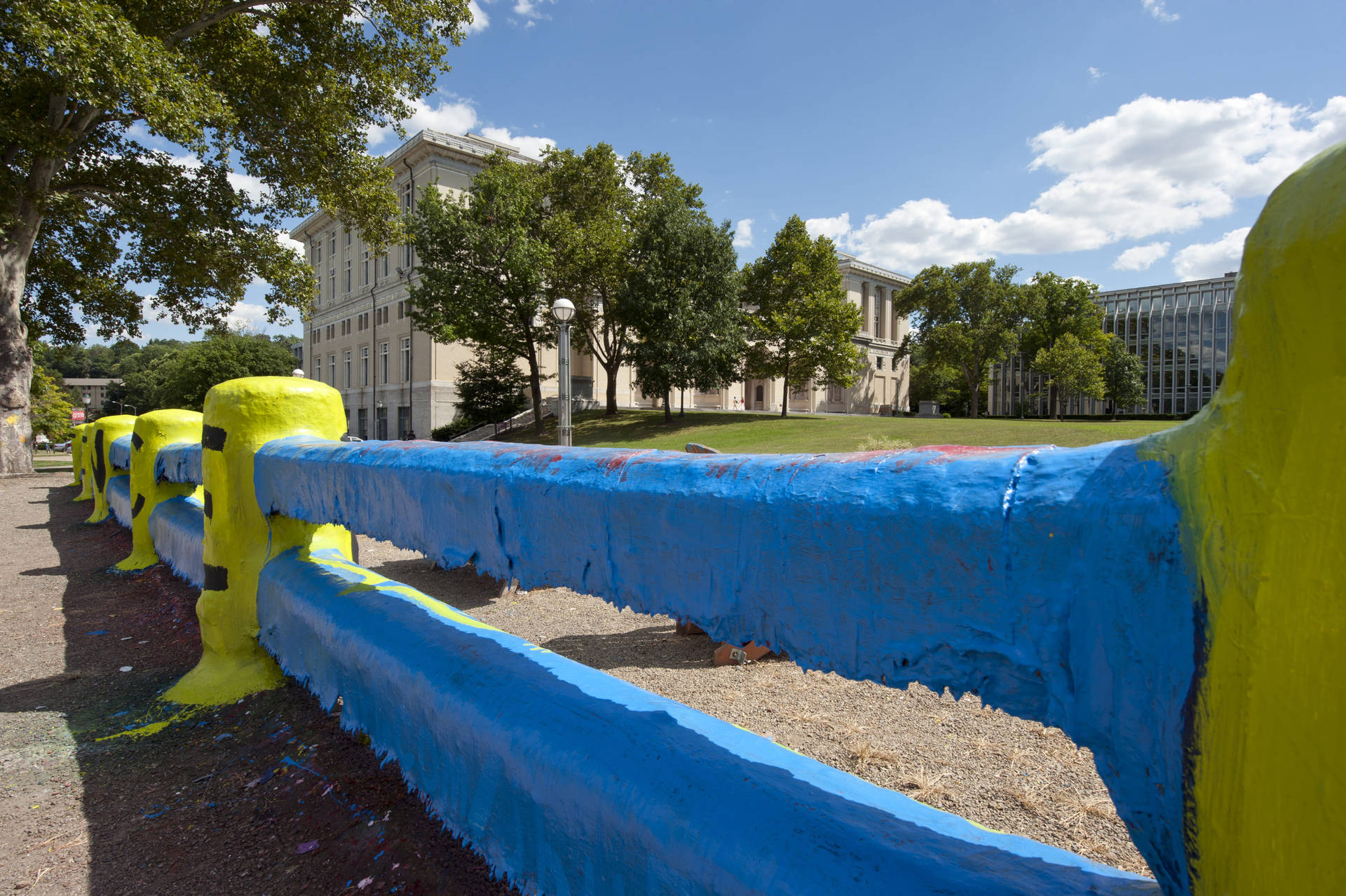 A Vibrant Day At Carnegie Mellon University Around The Iconic University Fence