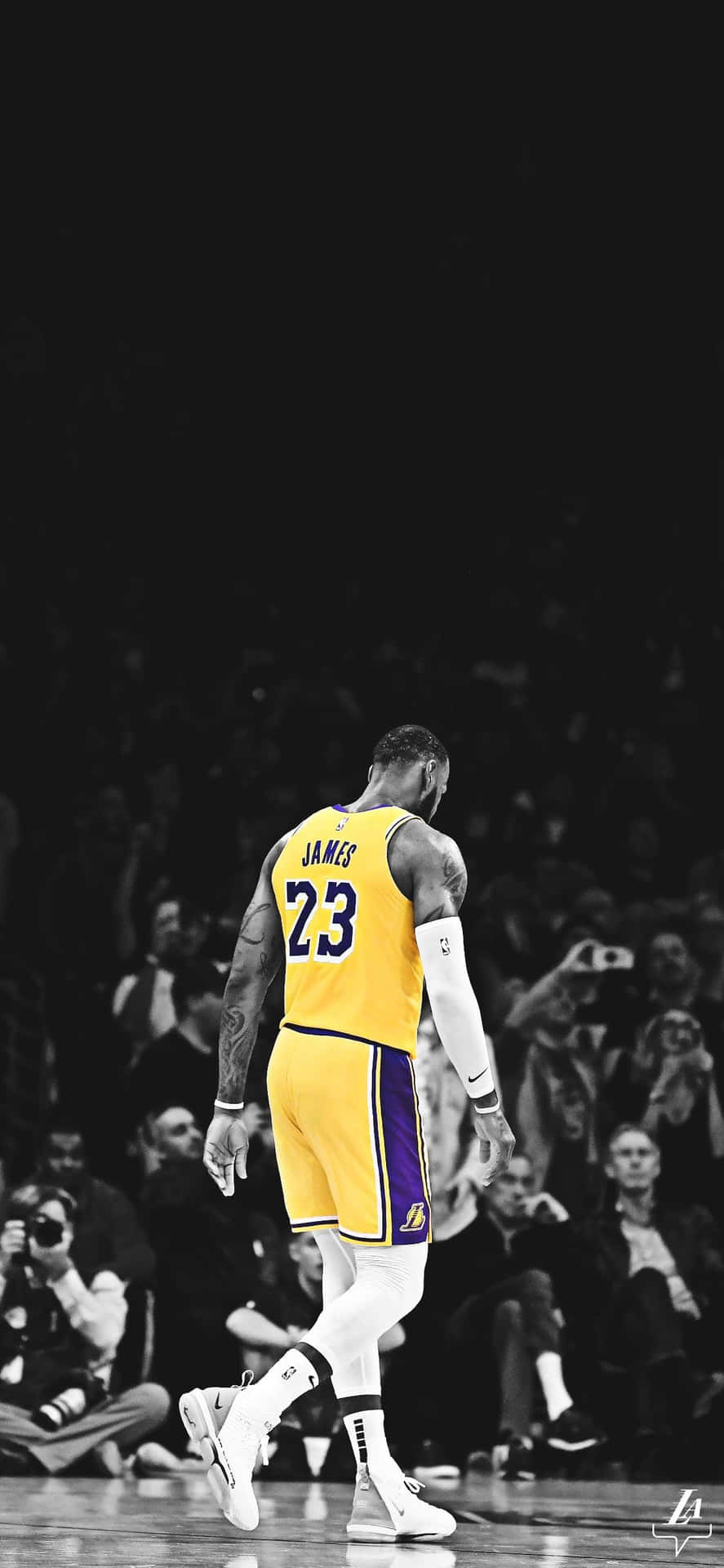 A Vibrant Image Of Lebron James Using His Iphone. Background