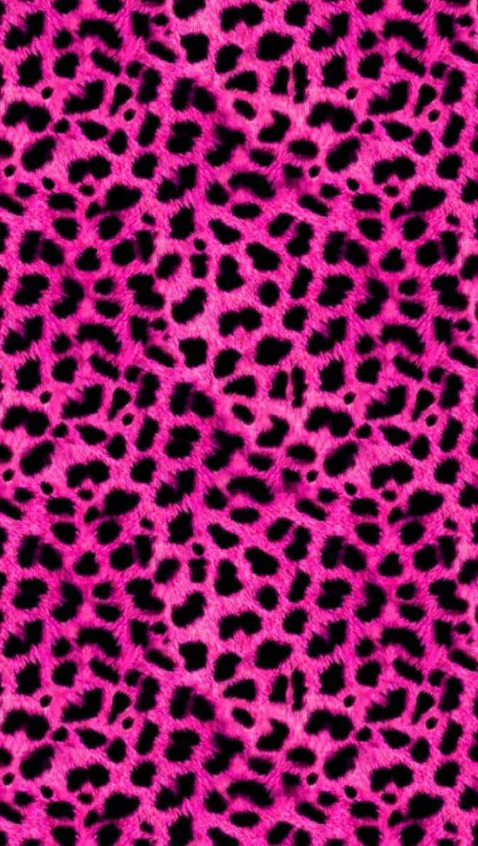 A Vibrant Pink And Black Leopard Print In A Classic Animal-inspired Pattern. Background