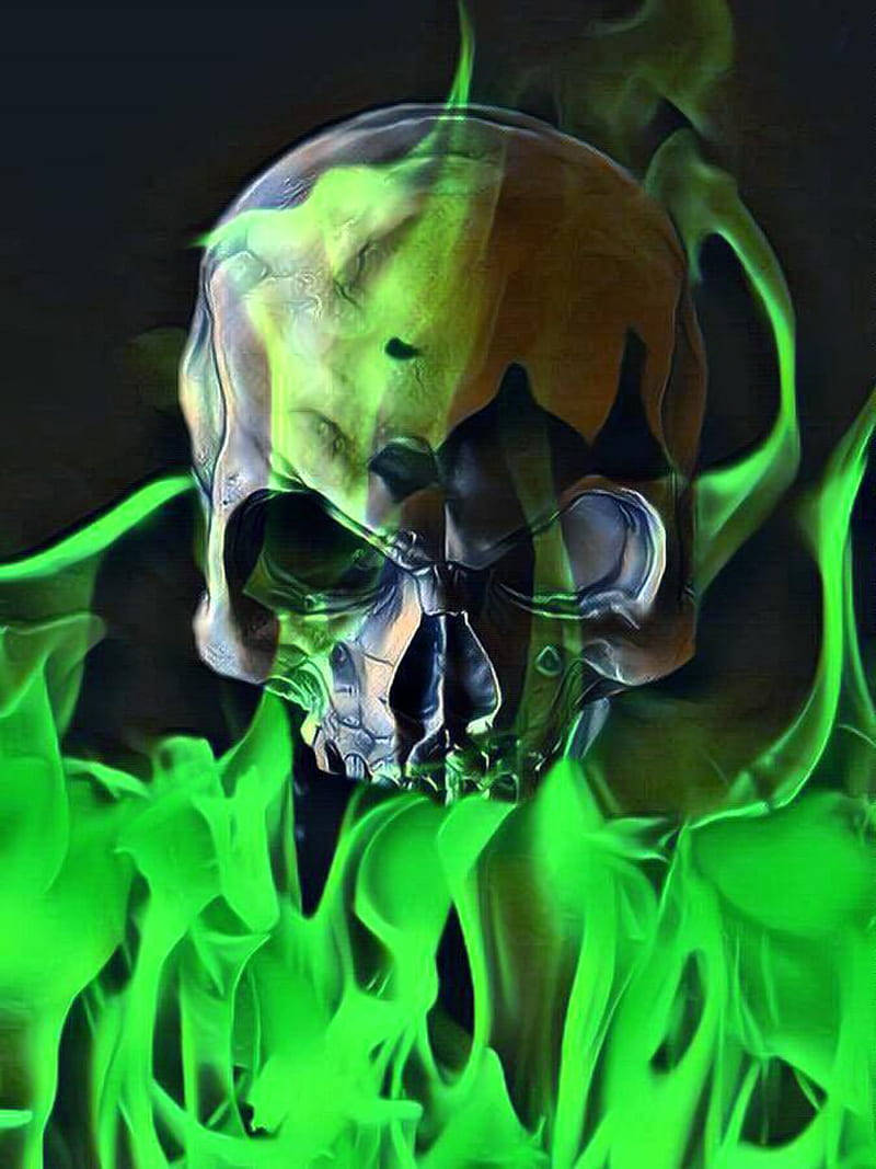 A Vibrant Skull Engulfed In Flames, With A Brilliant Green Aura Enthralling The Black And Orange Colors.