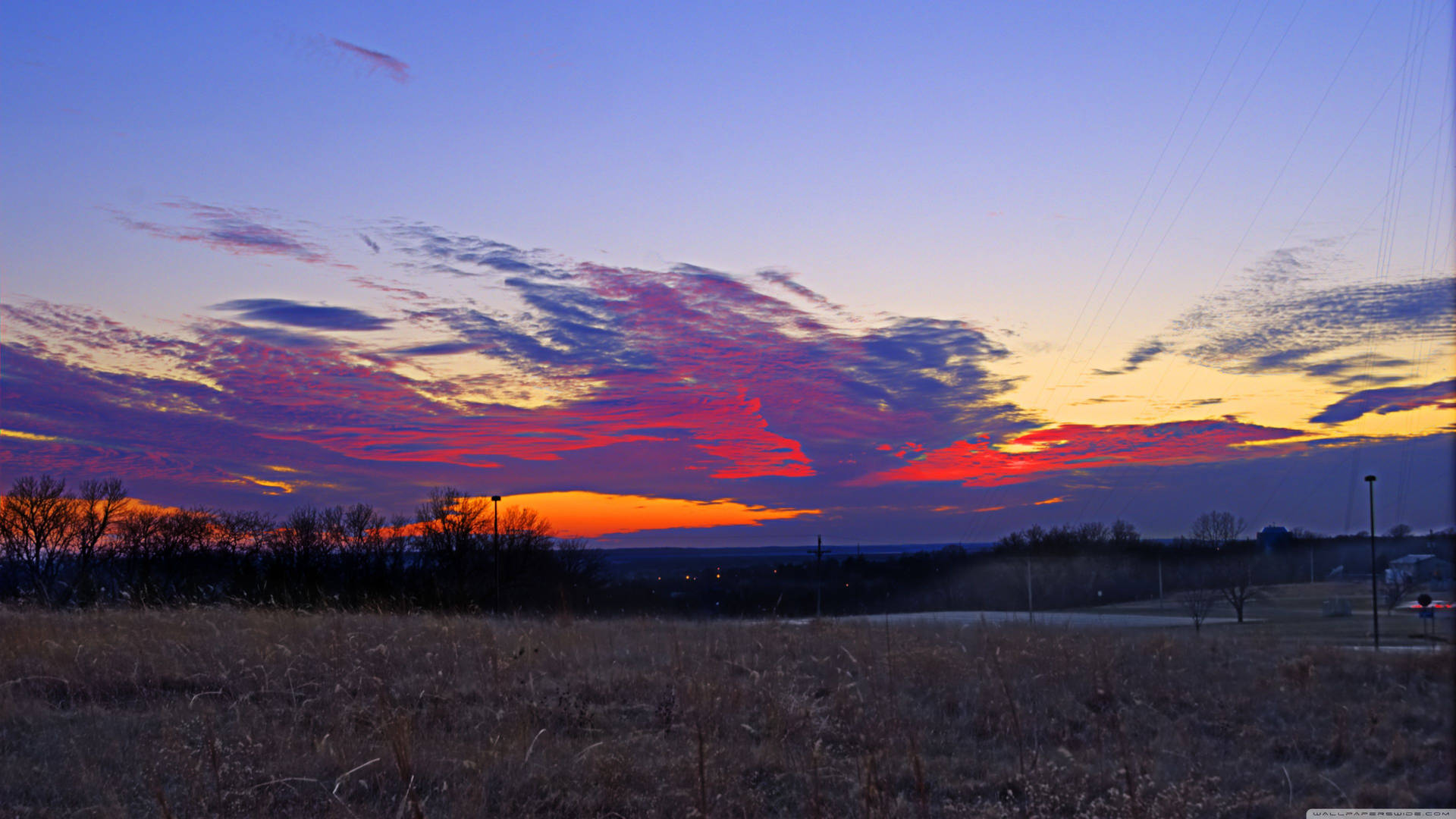 A Vibrant Sunset Over Kansas Background