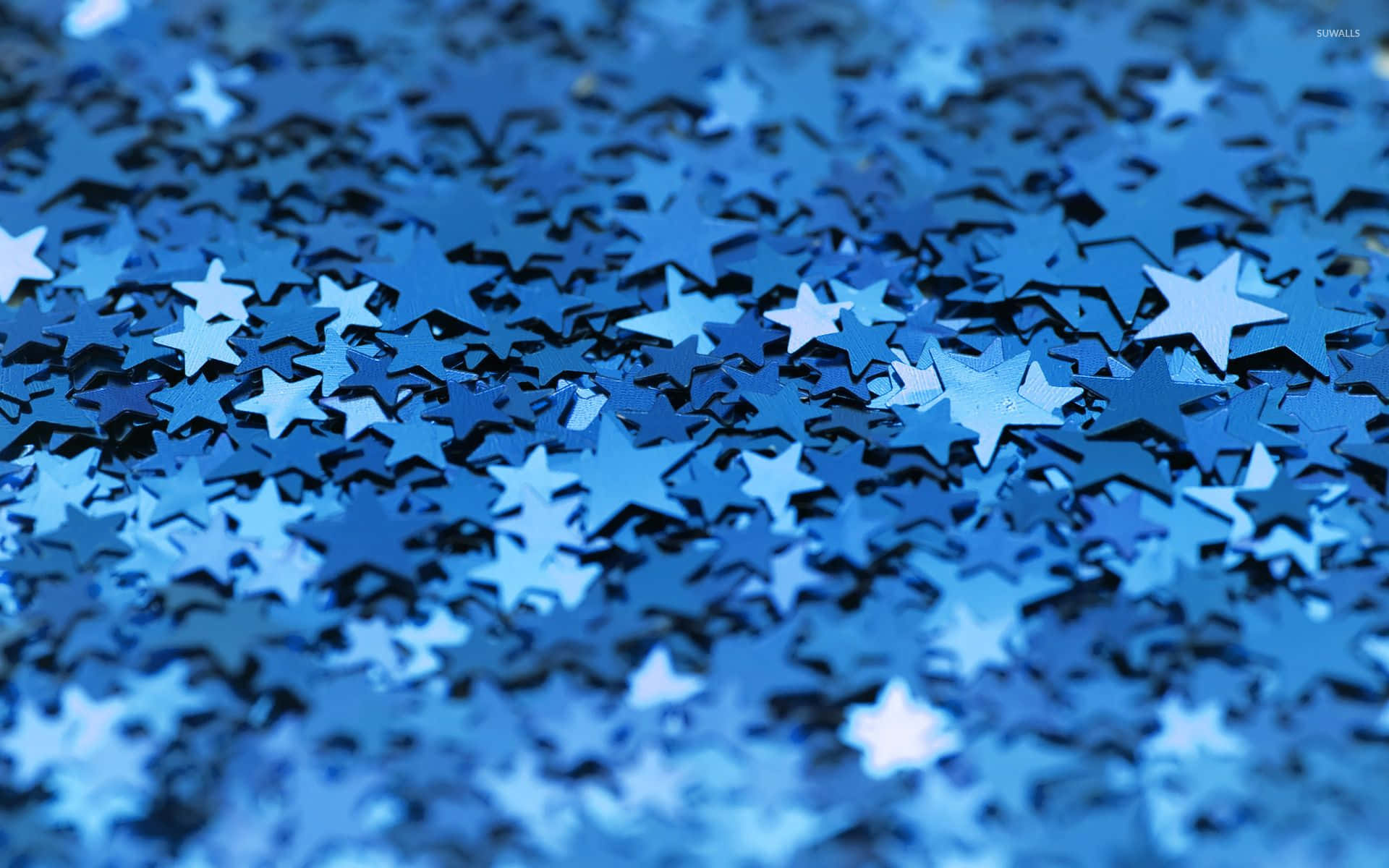 A View Of A Night Sky Filled With Bright Blue Stars Background