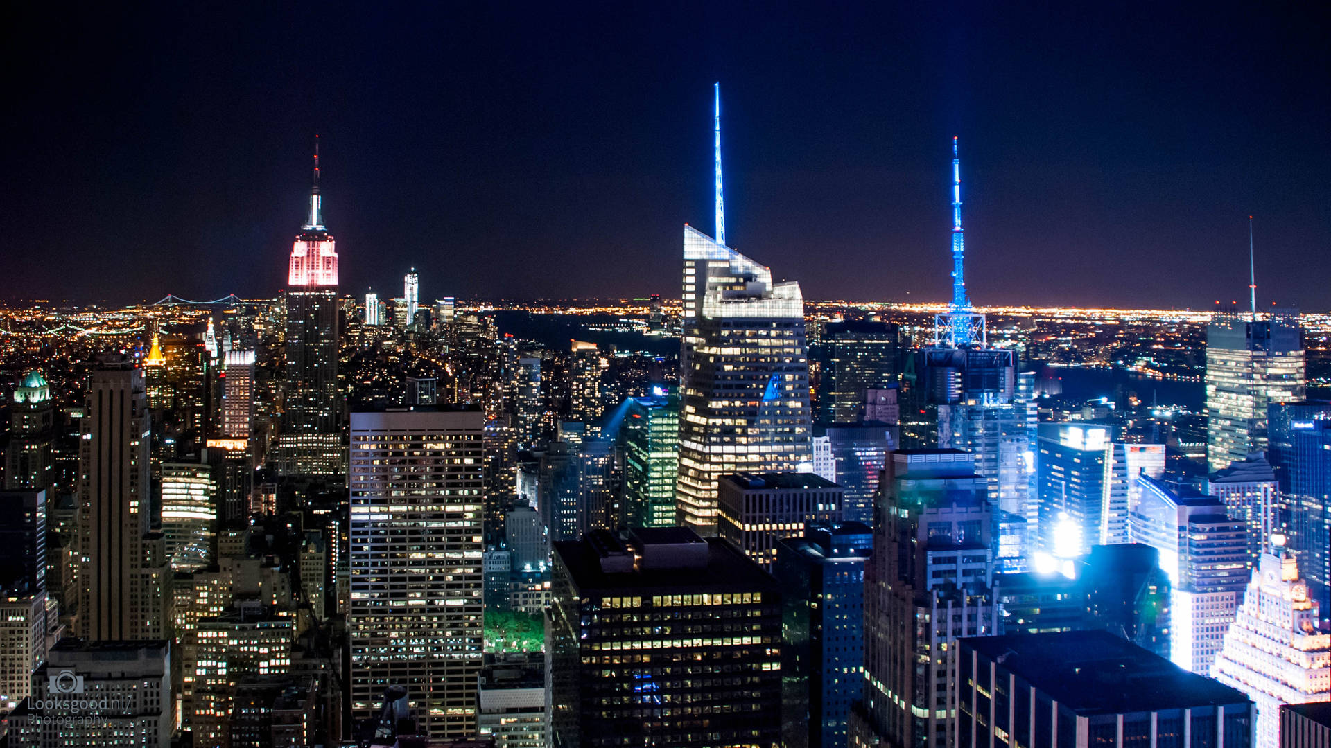 A View Of The City At Night Background