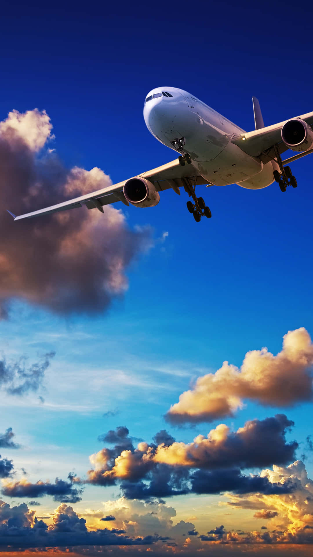 A View Of The City Skyline And A Person Using A Phone While On A Plane Background