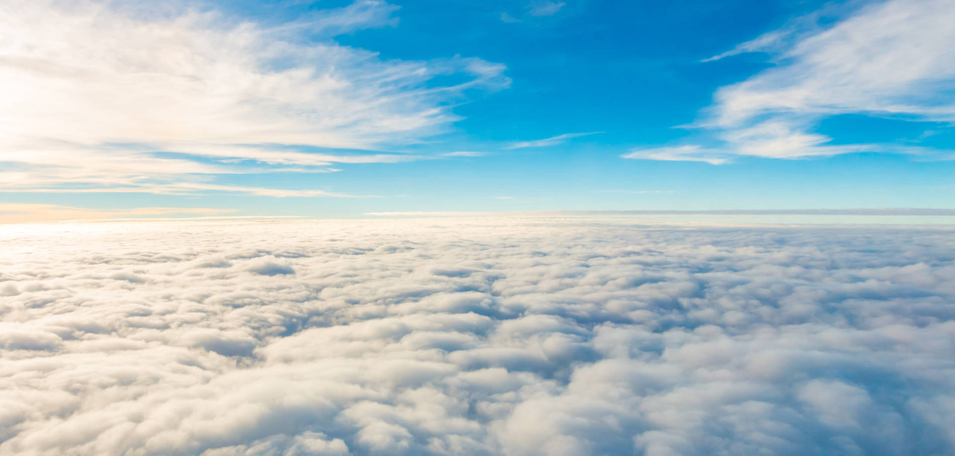 A View Of The Clouds From An Airplane Background